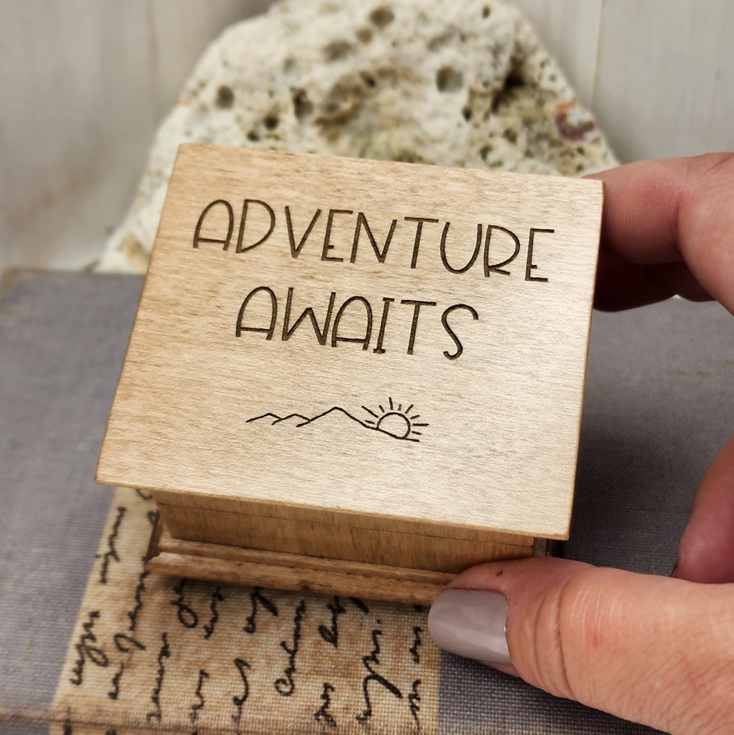 Music Box engraved with Adventure Awaits and some simple mountain and sun image, choose color, song add a personalized message, What a wonderful world, You are my sunshine, Somewhere over the rainbow