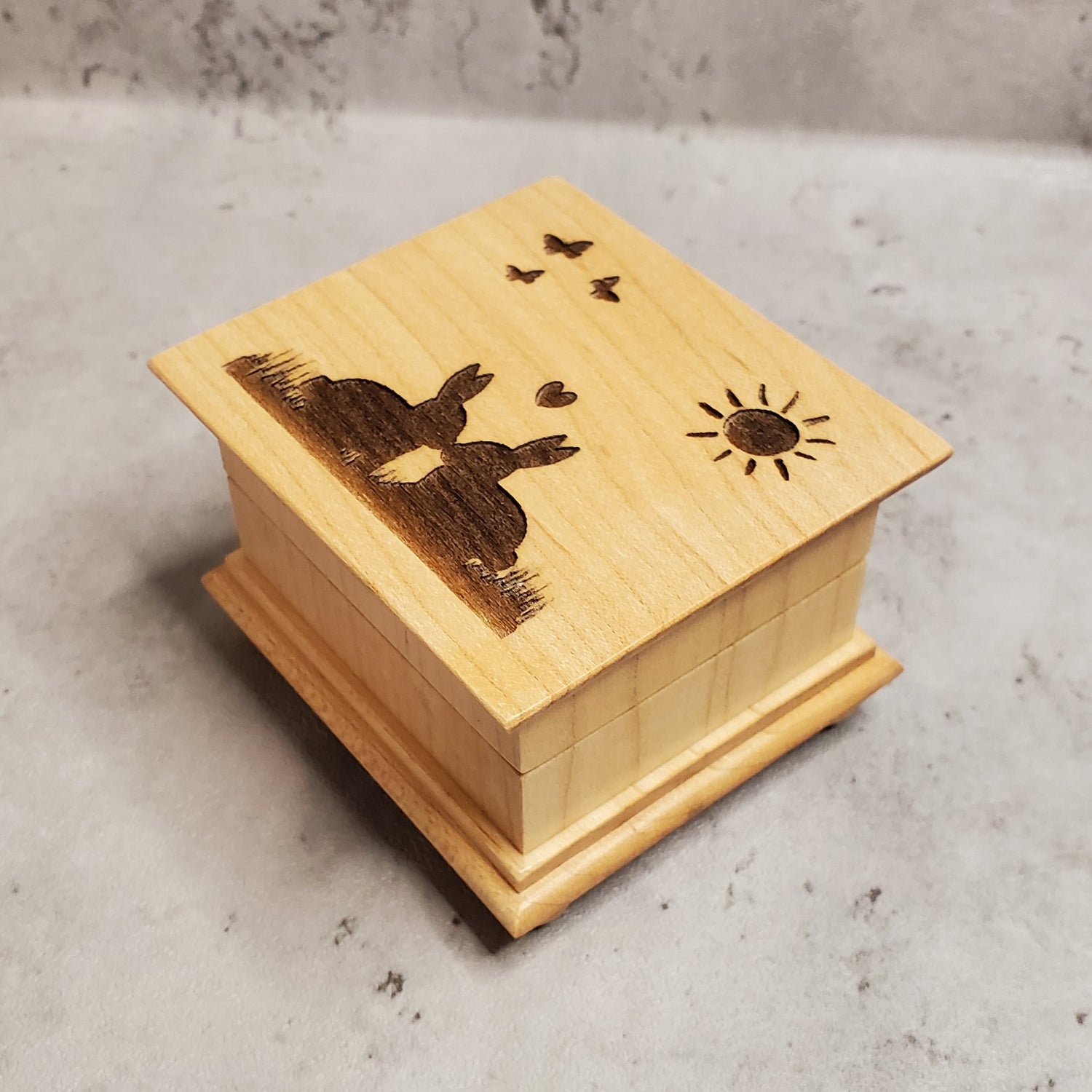 Easter Bunny music box with bunny kisses, butterflies and sun engraved on top of the music box, choose color and song