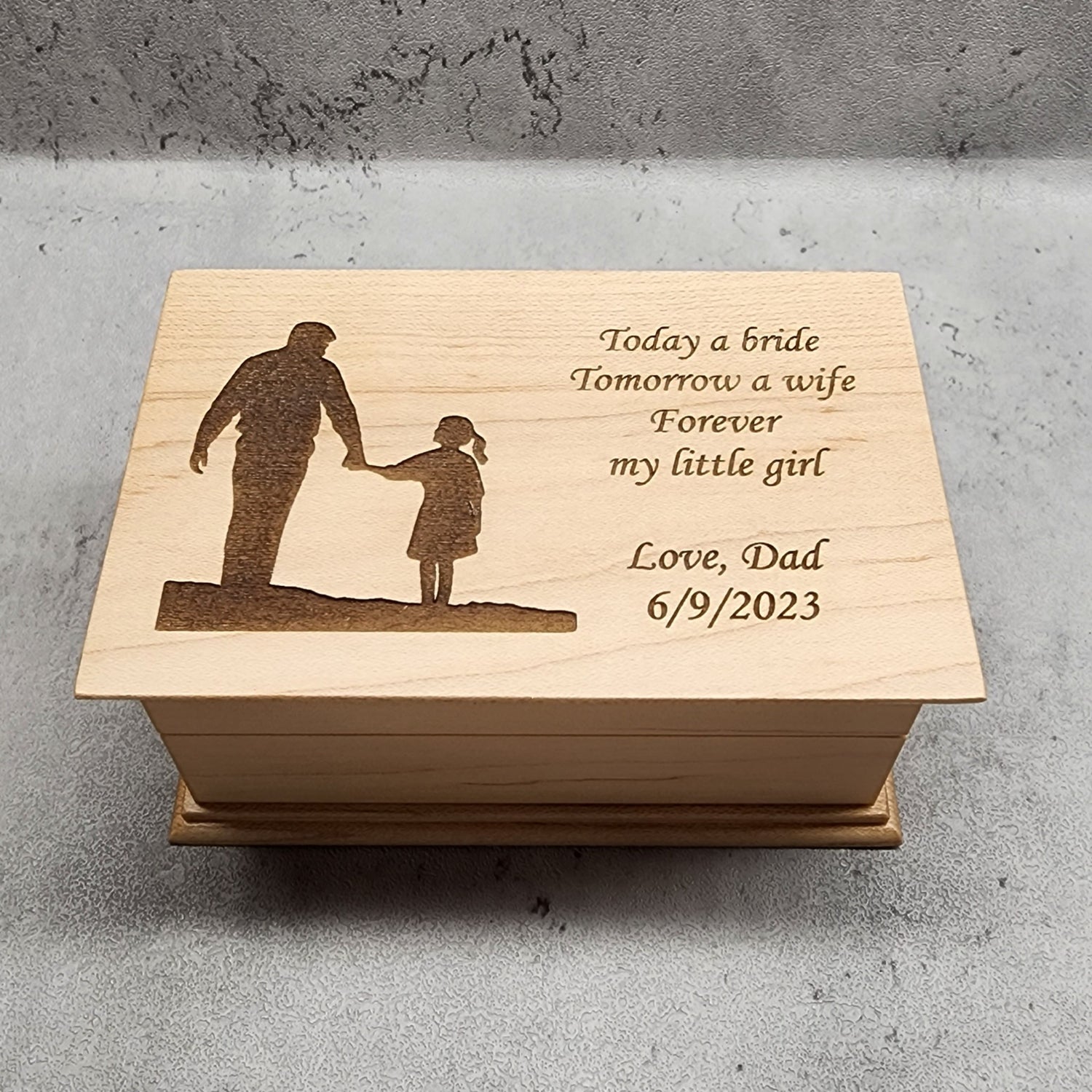 wooden music jewelry box with a dad and daughter holding hands silhouette engraved on top along with the quote Today a bride tomorrow a wife forever my little girl Love, Dad with the date, choose from 9 different colors and add your father-daughter dance song