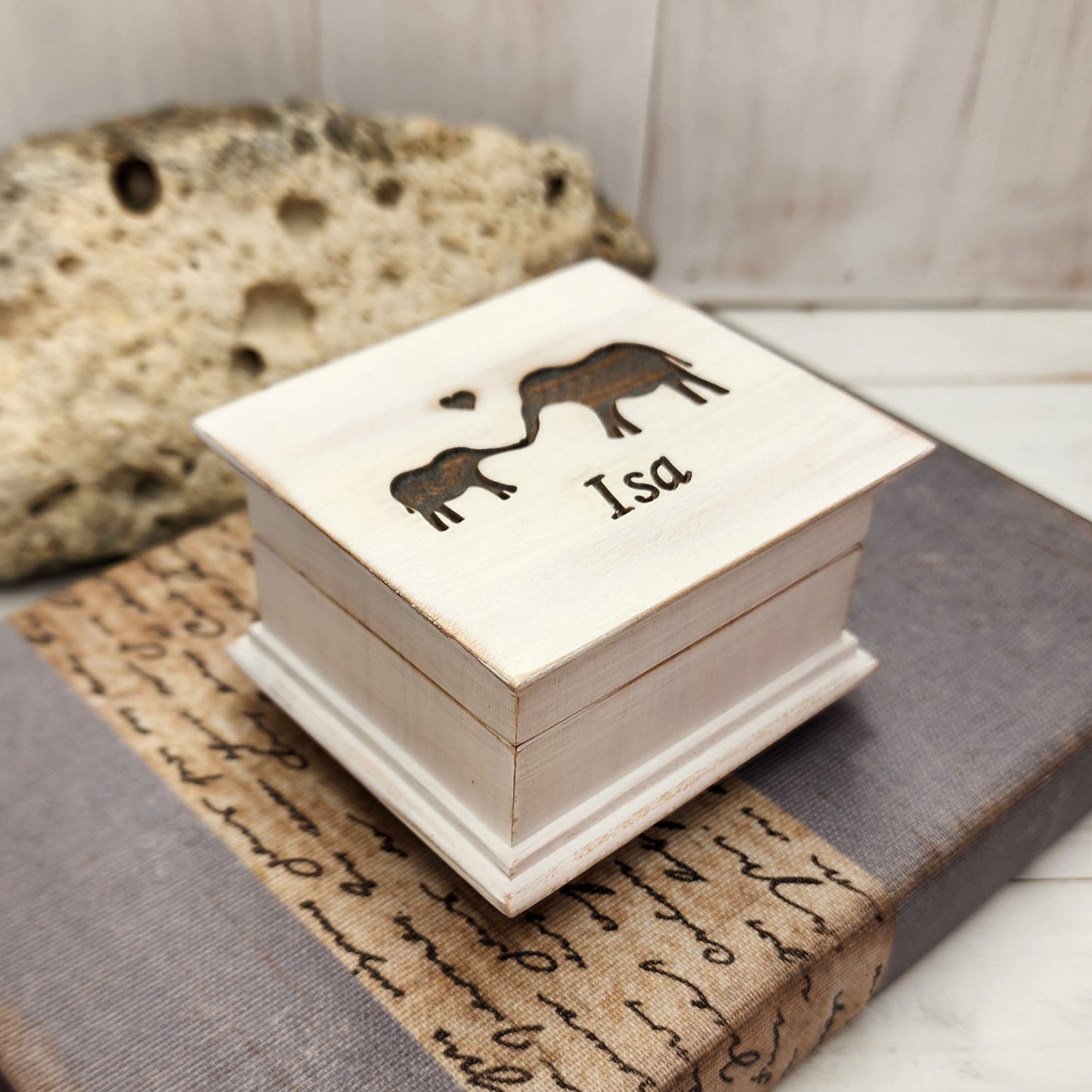 handmade music box with baby and momma elephants engraved on top along with the name, choose color, song, add personalized message to the bottom side