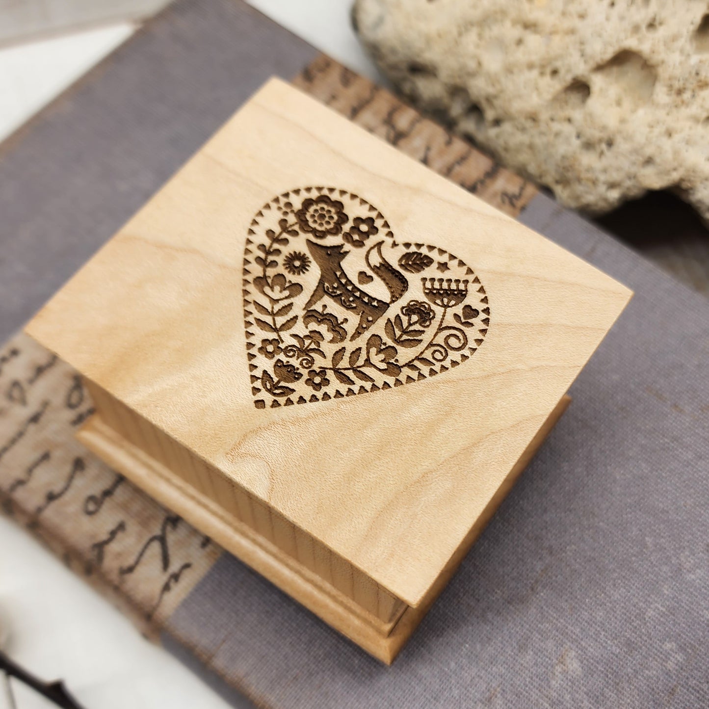 music box with fox in a heart engraving