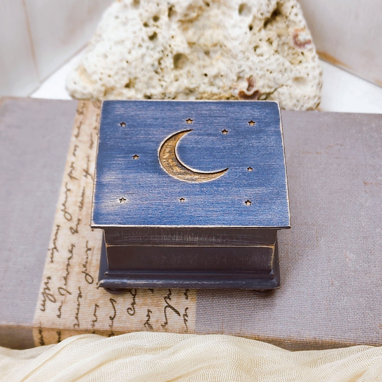 Moon and Stars Music Box, choose from 70songs and 16 different colors and add a customized message to the bottom side of the box to create your unique keepsake