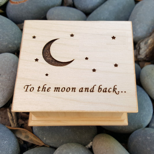 To the moon and back music box with moon and stars engraved on top, choose color and song
