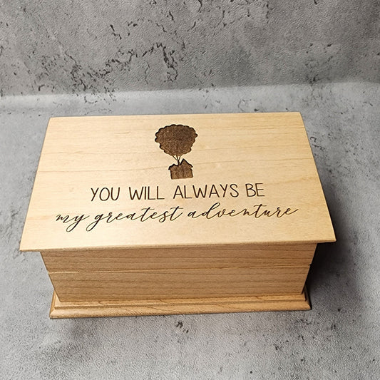 High quality jewelry box with music player built in, engraved with "You will always be my greatest adventure"