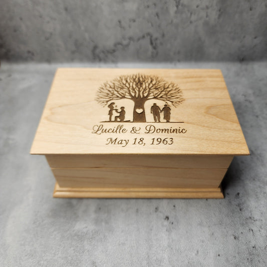 jewelry box in maple with a tree with a young couple on one side and an older couple on the other side of the tree, your names and date under the design