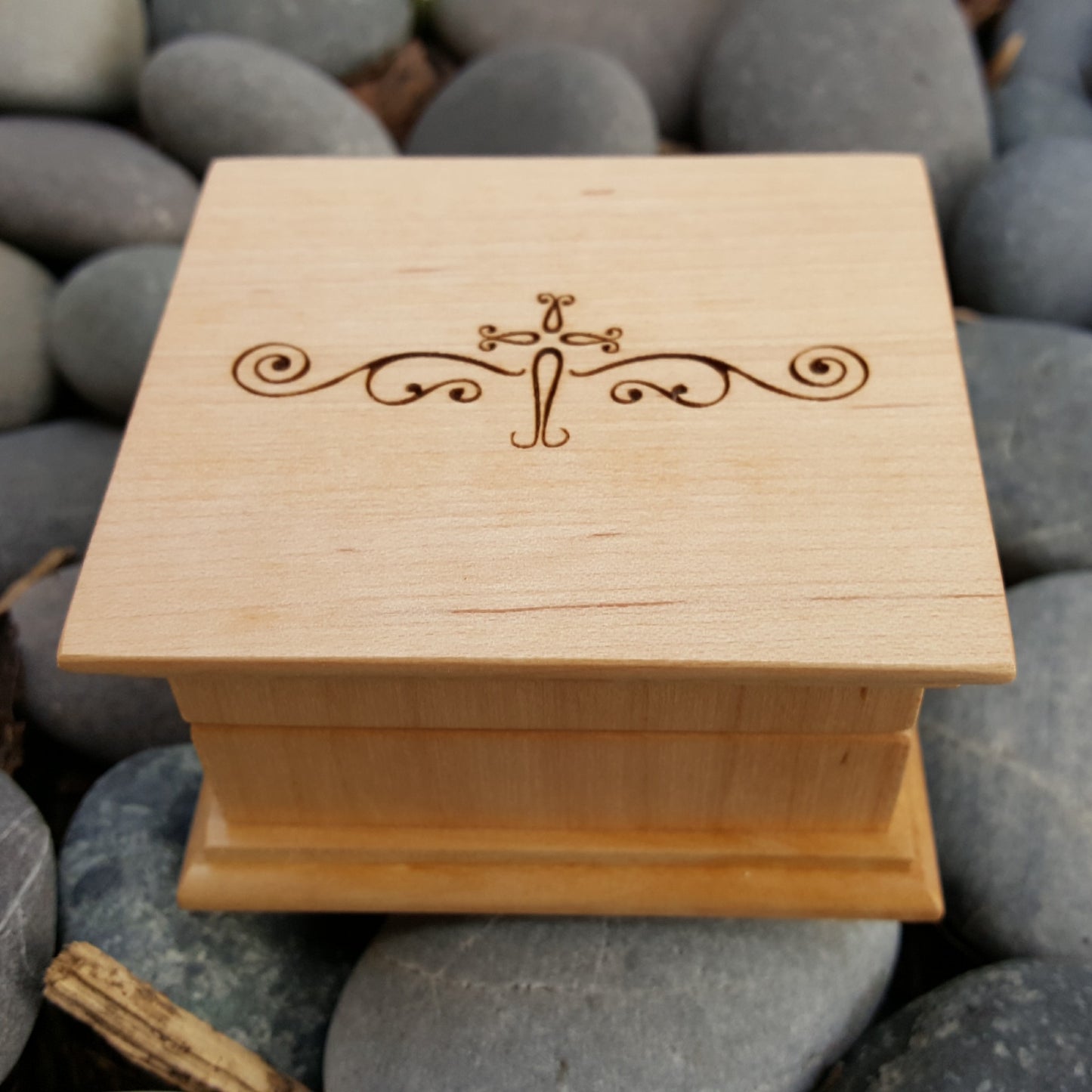 cross engraved music box made with maple wood. Perfect baptism gift with personalized engraving, choice of song and color