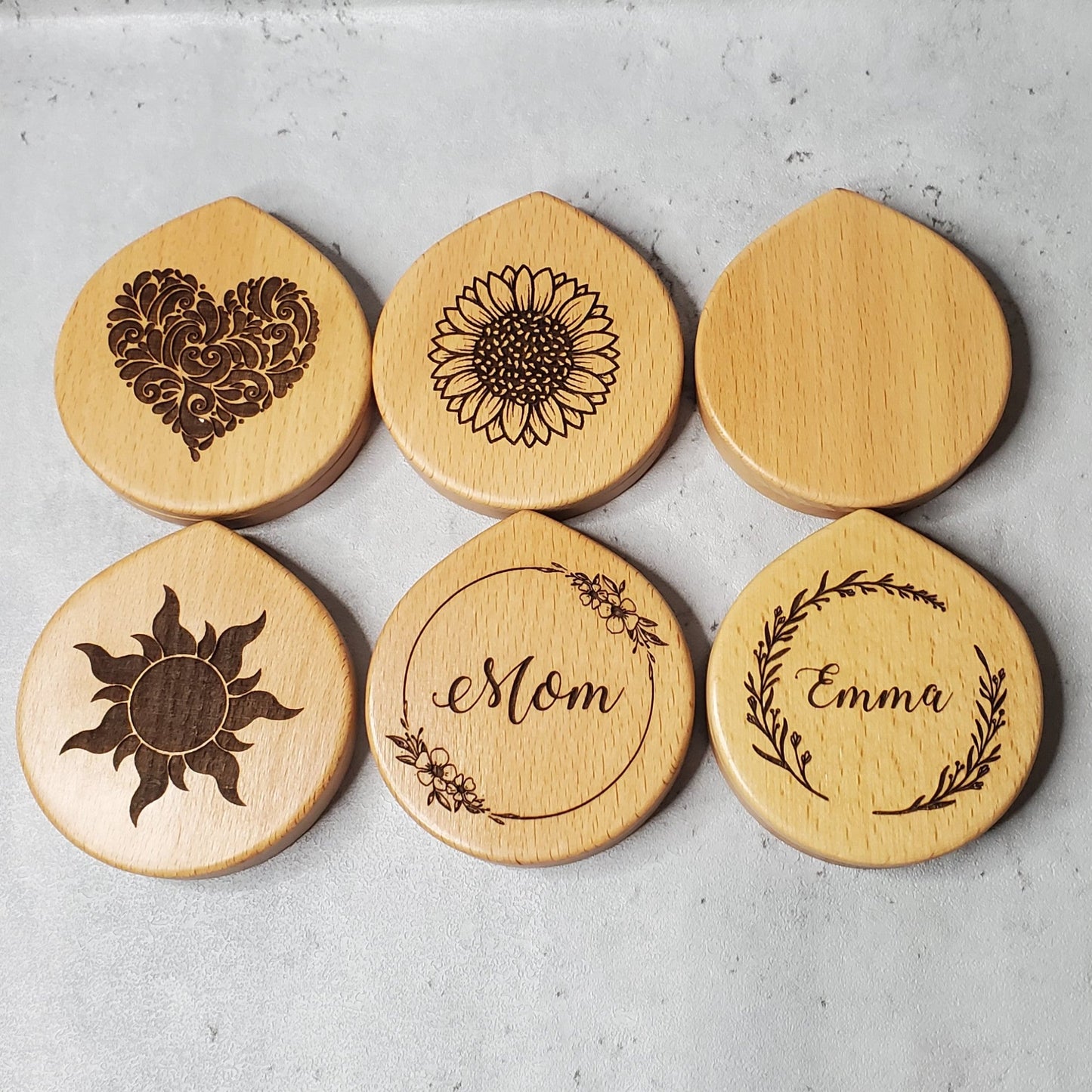 Engraved mirror collection, introduces some of the engraving ideas, a heart, a sunflower, a sun, or your name in a decorative round frame