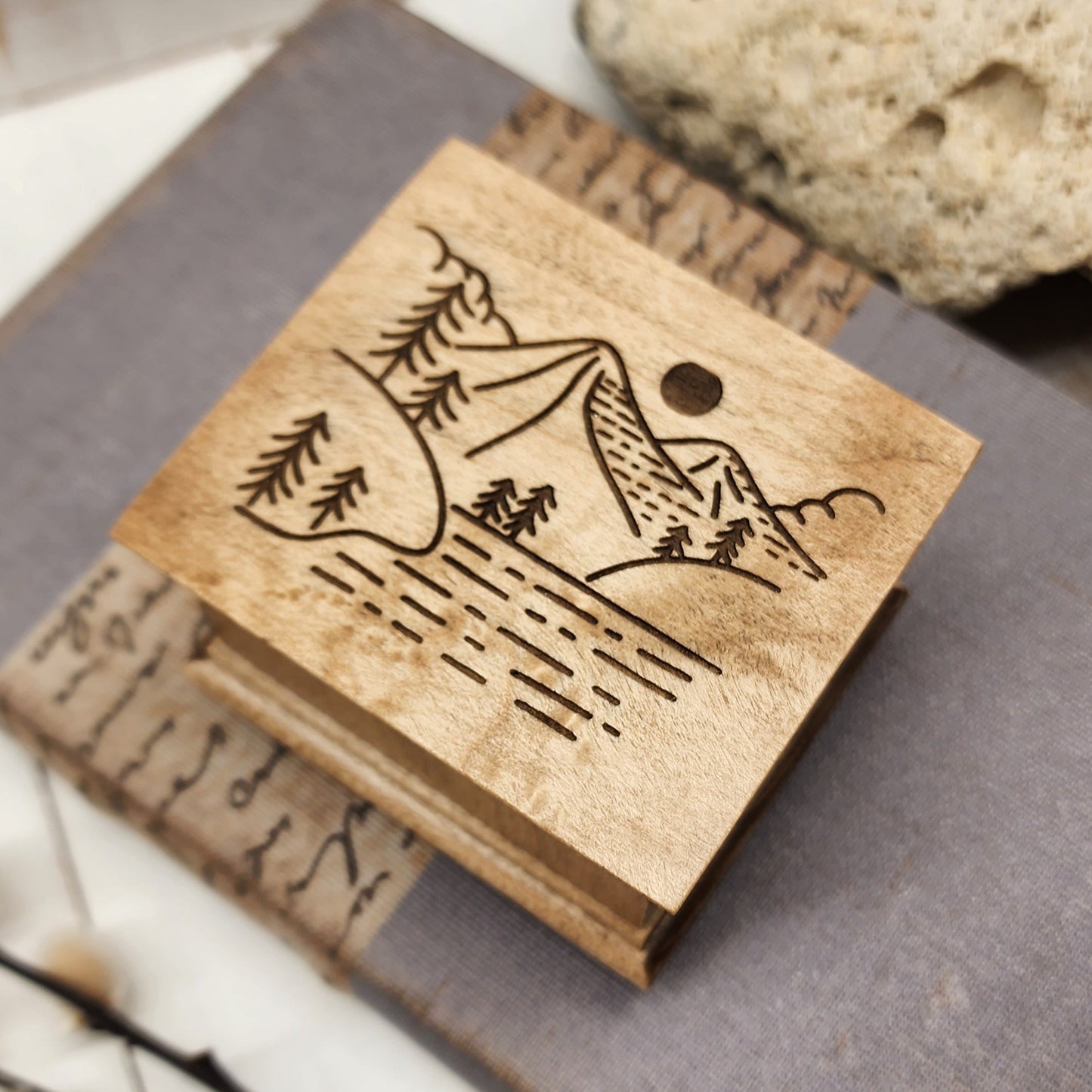 Music box with a mountain scene on top, choose color and song, add personalized message