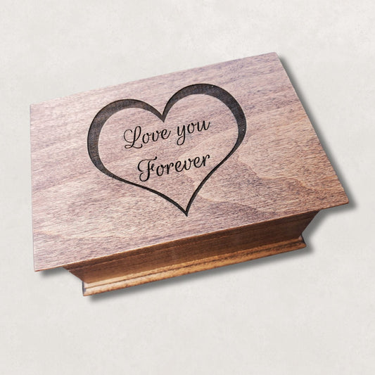 Wooden jewelry box engraved with heart outline and the words Love You Forever on the lid