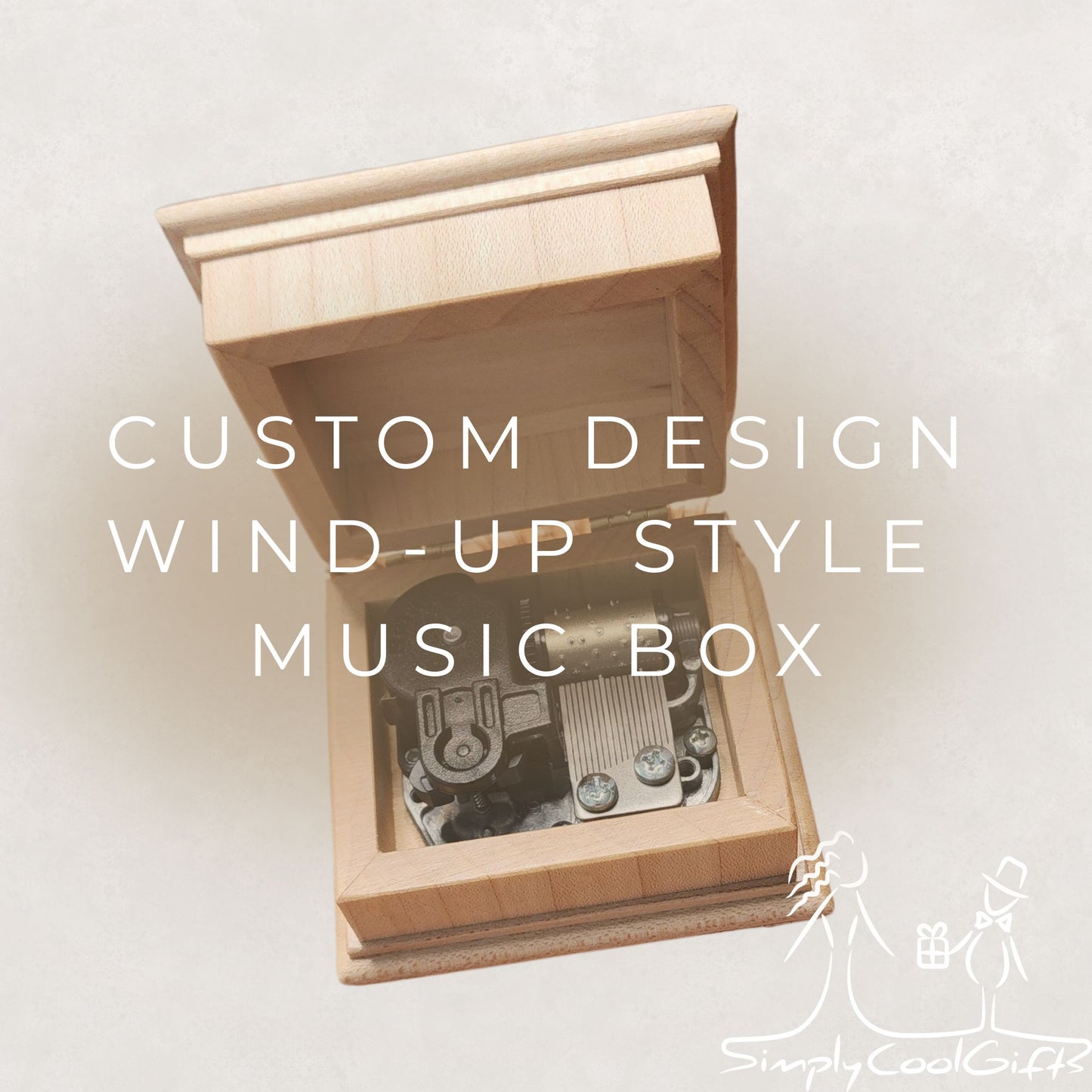 Wooden music box with wind-up mechanism on a light background