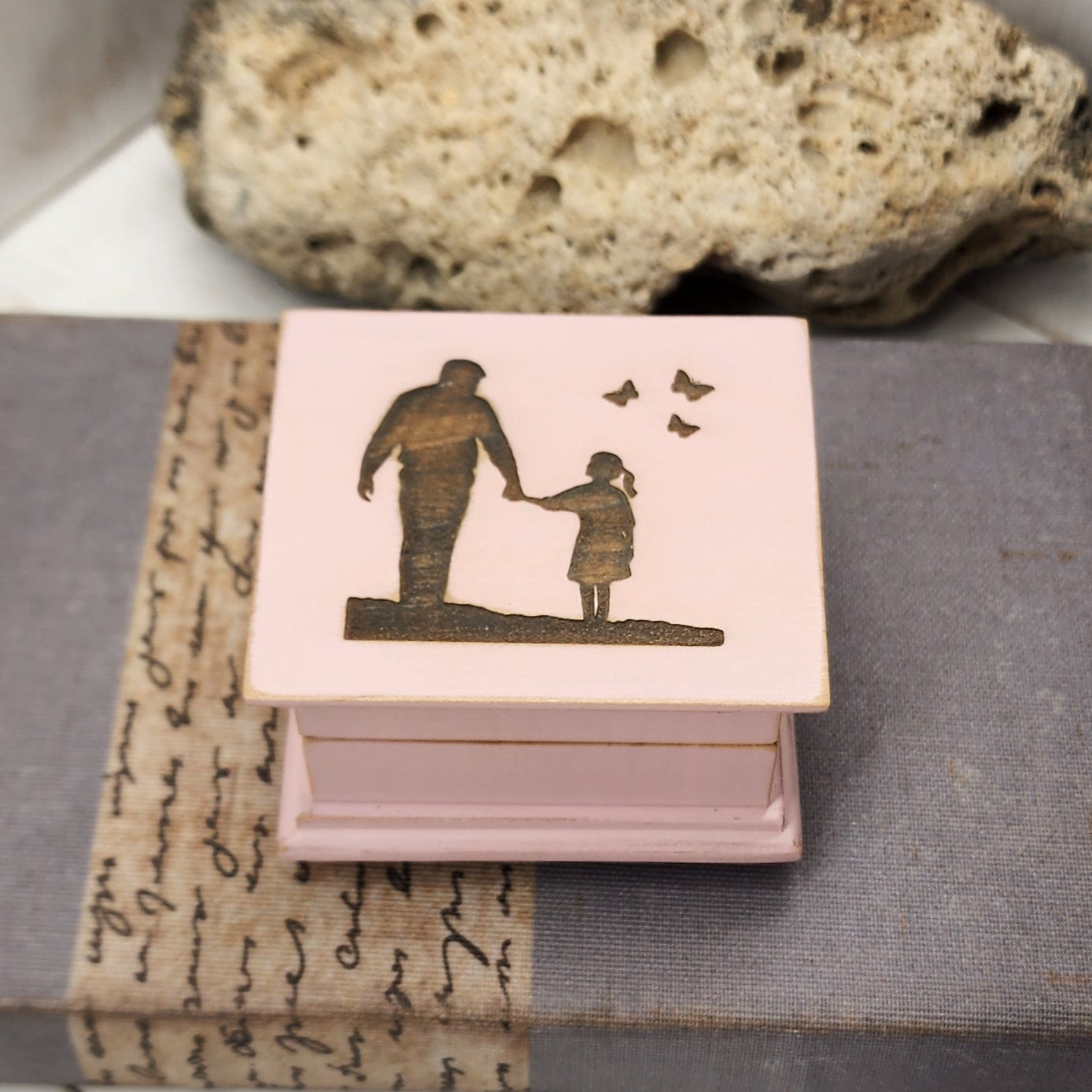 wind up style music box made with maple wood with dad and daughter with 3 butterflies engraved on top, choose from about 70 songs, and 16 colors add a personalized message to the bottom side of box