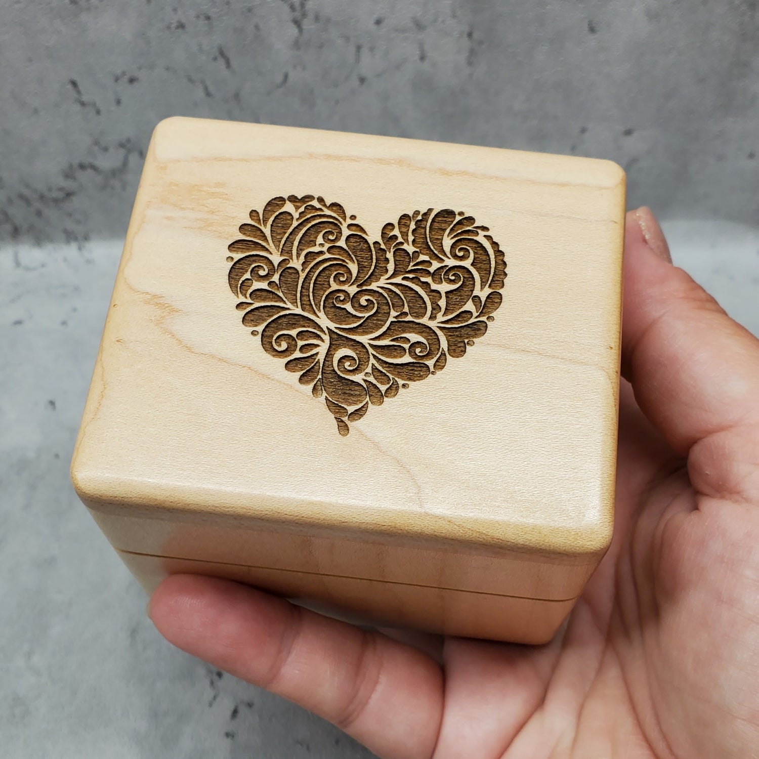 engagement box with a decorative heart engraved on top made with high quality maple wood