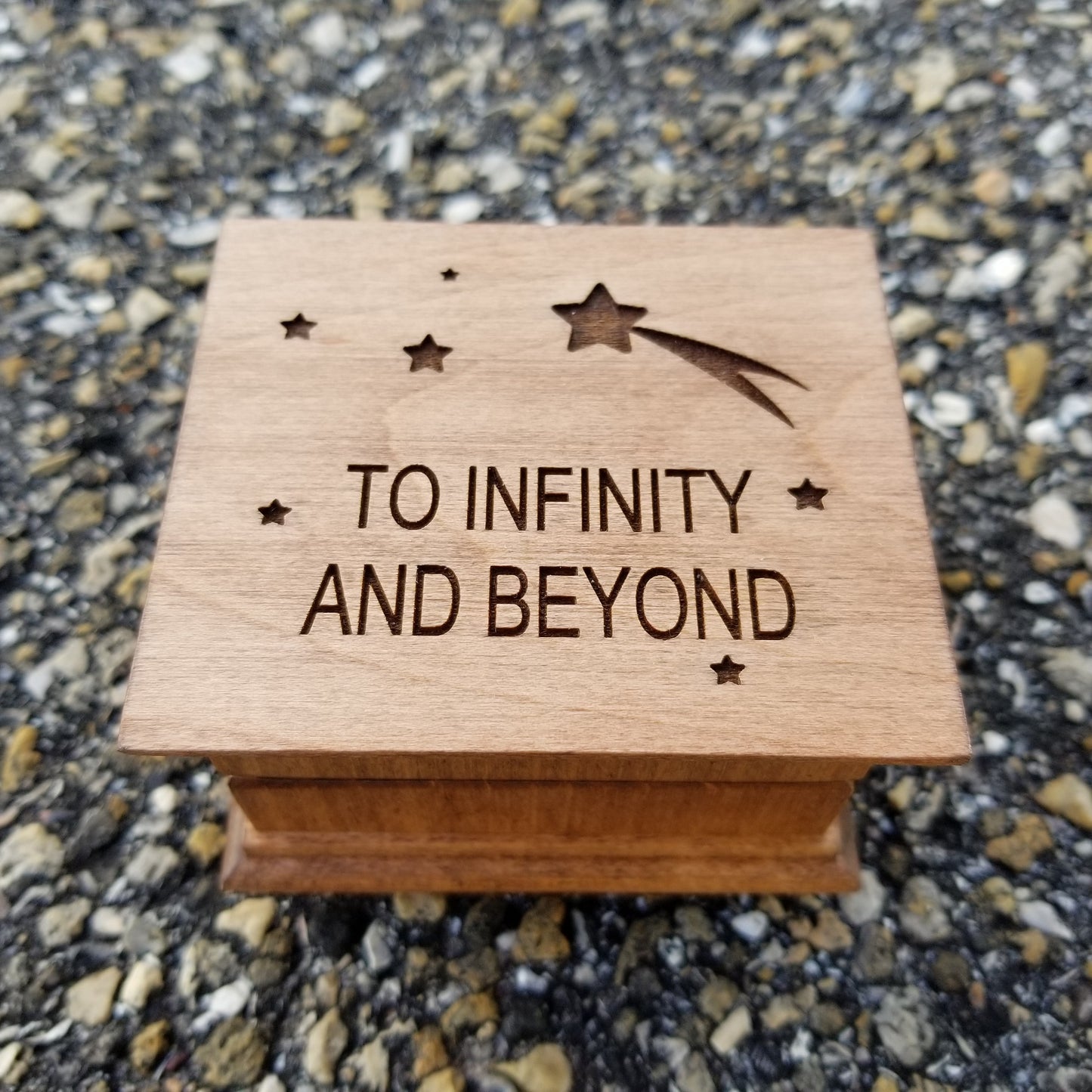 To infinity and beyond music box with stars and shooting star, choose color and song