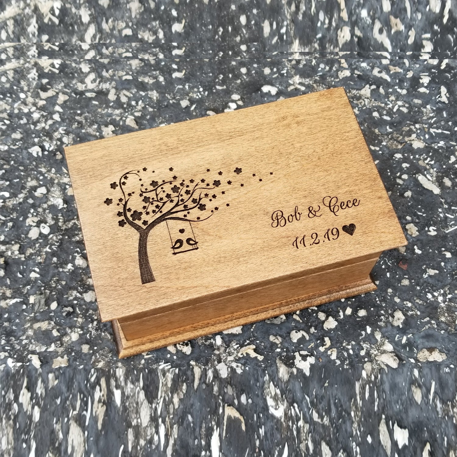 Jewelry Box with love birds on tree swing, personalized with your names and date, plays your song choice when opened and it is made with high quality US maple wood, made in the US