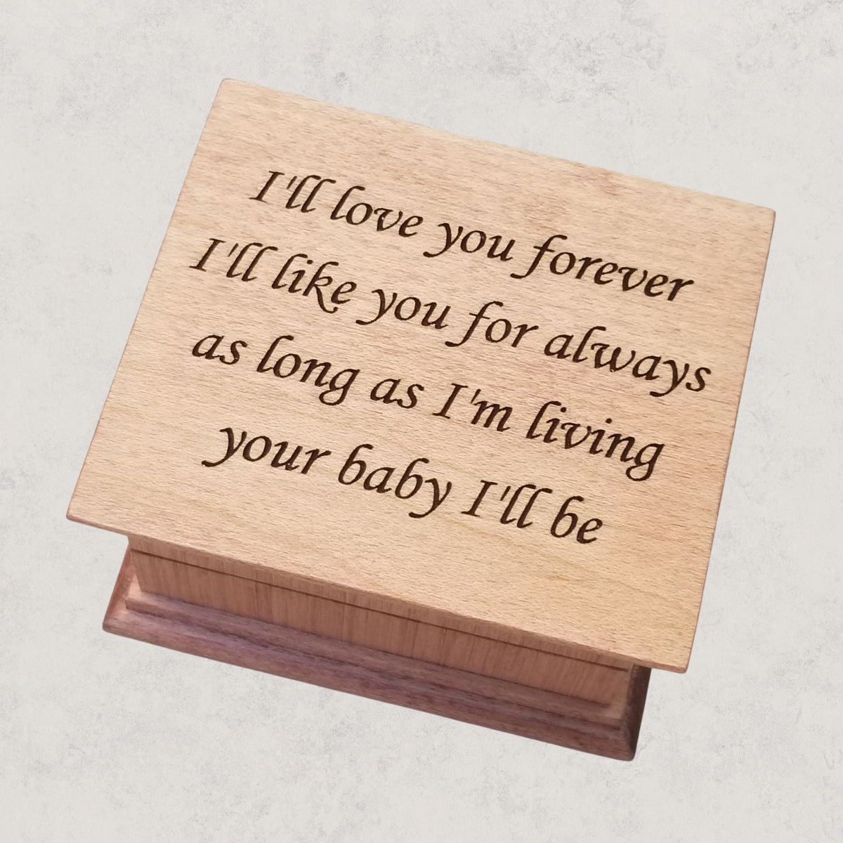 Personalized engraved wind-up music box for mom made of solid wood, handmade keepsake gift. The engraving says
I'll love you forever
I'll like you for always
as long as I'm living 
your baby I'll be