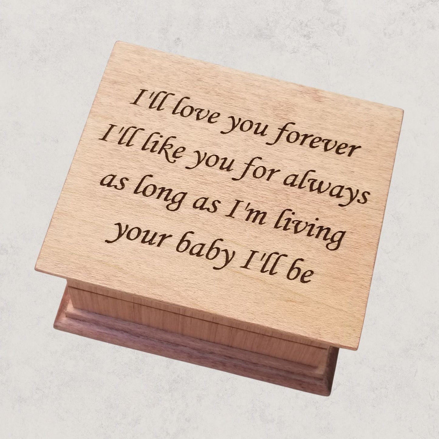 Personalized engraved wind-up music box for mom made of solid wood, handmade keepsake gift. The engraving says
I'll love you forever
I'll like you for always
as long as I'm living 
your baby I'll be