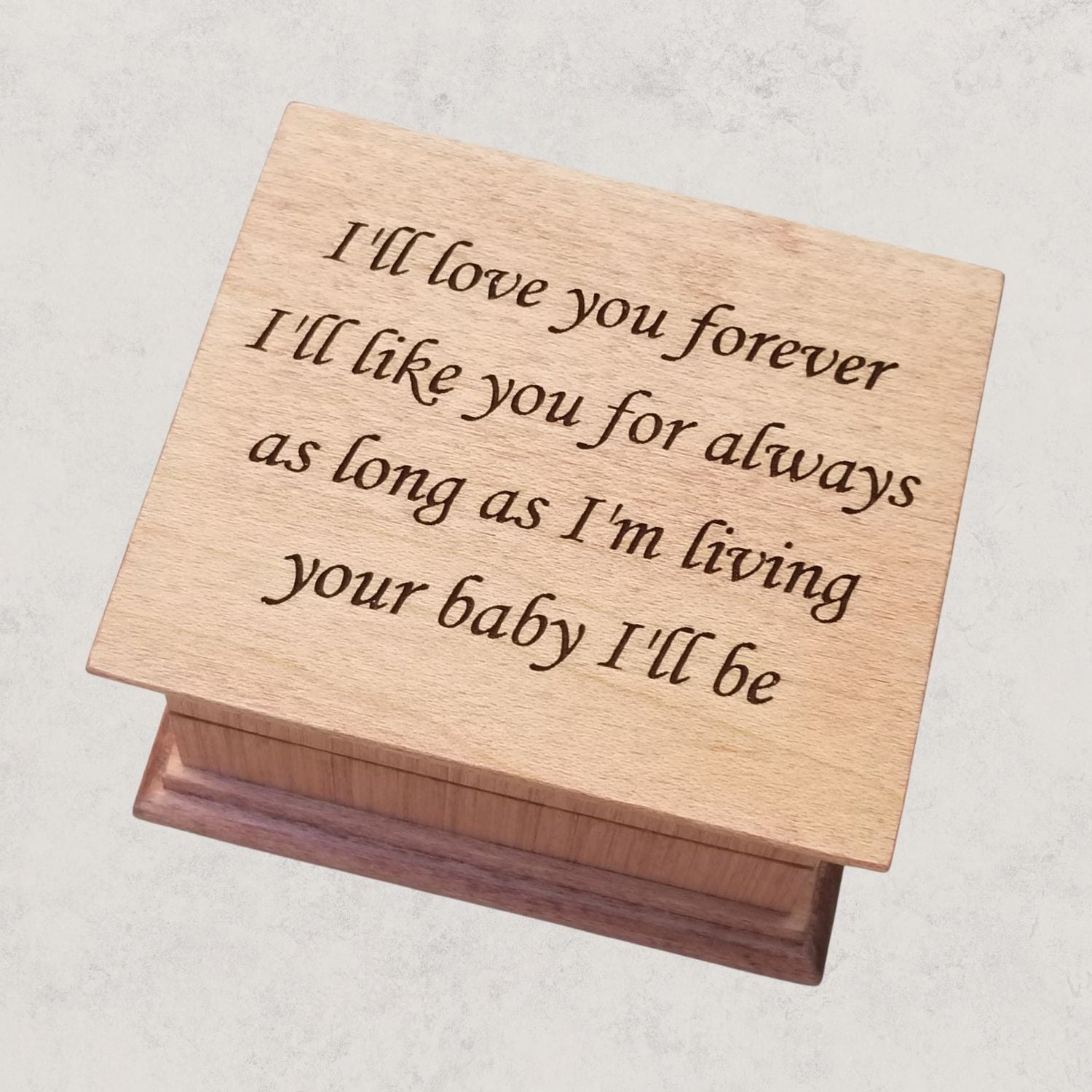 Personalized engraved wind-up music box for mom made of solid wood, handmade keepsake gift. The engraving says
I'll love you forever
I'll like you for always
as long as I'm living 
your baby I'll be