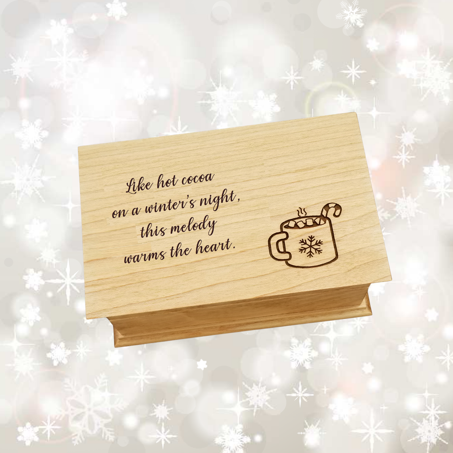 Christmas Music Jewelry Box with a quote
"Like hot cocoa on a winter's night, this melody warms the heart. " and a hot cocoa mug with a snowflake on the mug, marshmallows on the inside with a candy cane