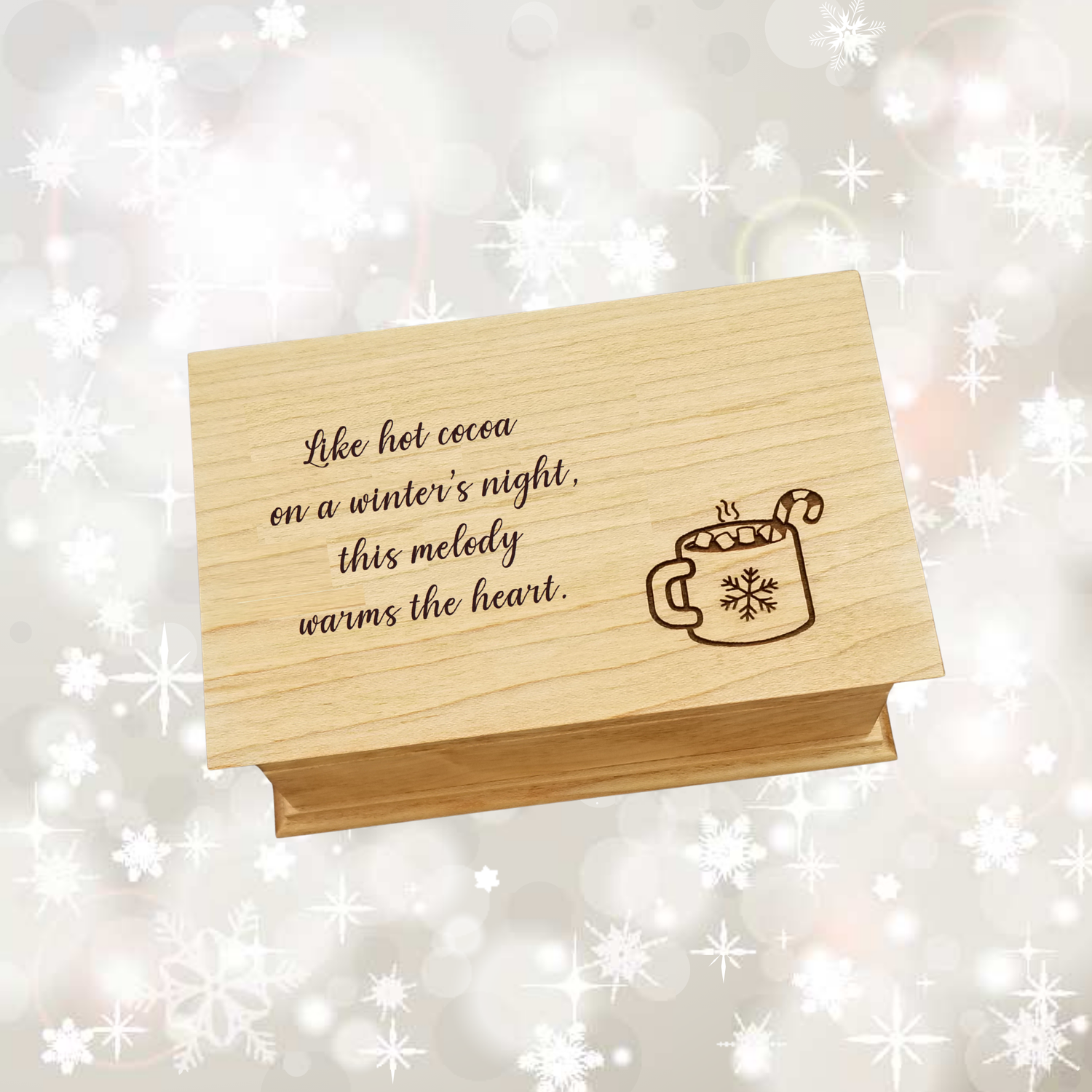 Christmas Music Jewelry Box with a quote
"Like hot cocoa on a winter's night, this melody warms the heart. " and a hot cocoa mug with a snowflake on the mug, marshmallows on the inside with a candy cane
