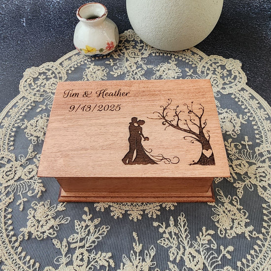 Bride and groom jewelry box with tree with heart carved in trunk. Names and date added to the upper left part, choose song and color