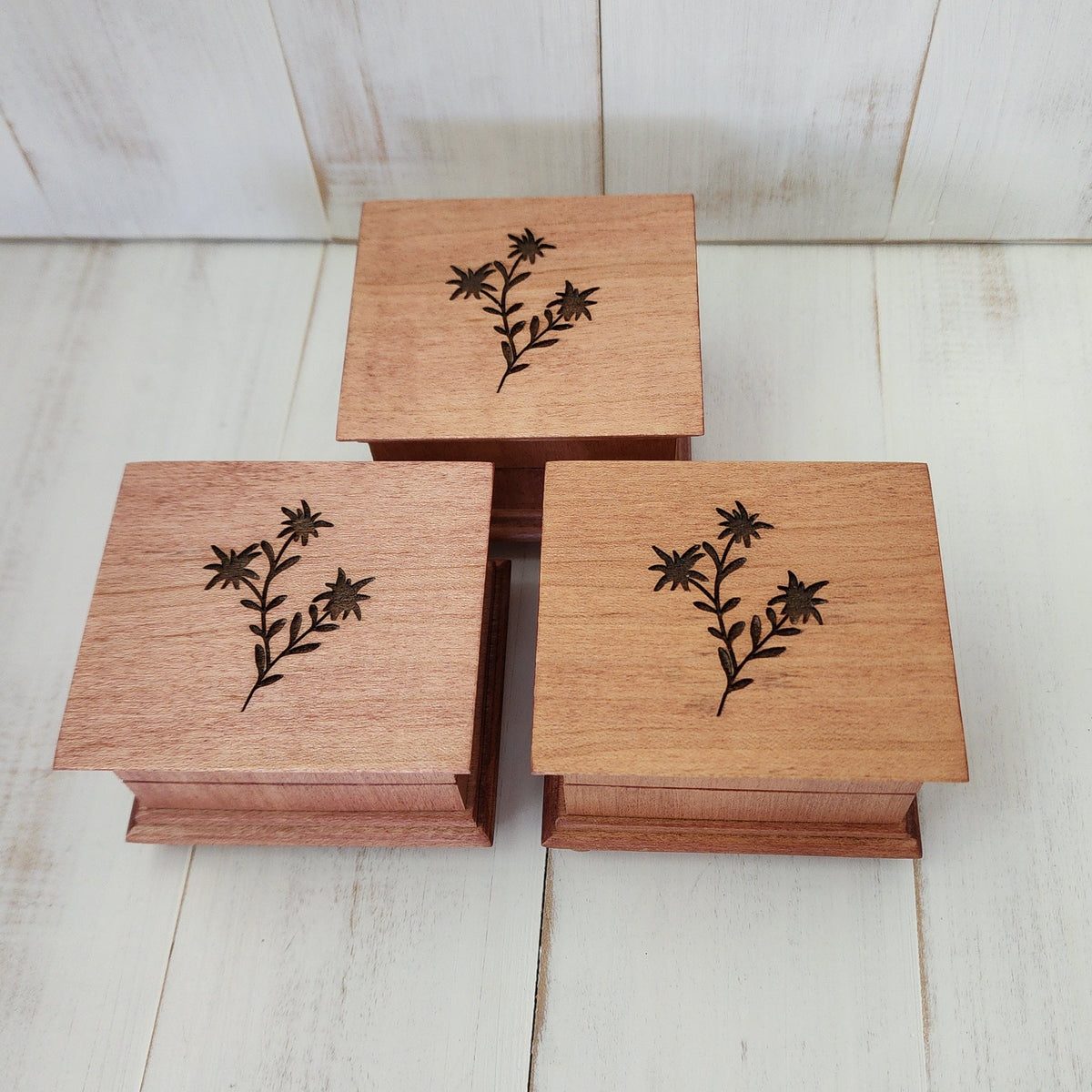 engraved music boxes all 3 the same sedona red color with an edelweiss flower engraved on the top