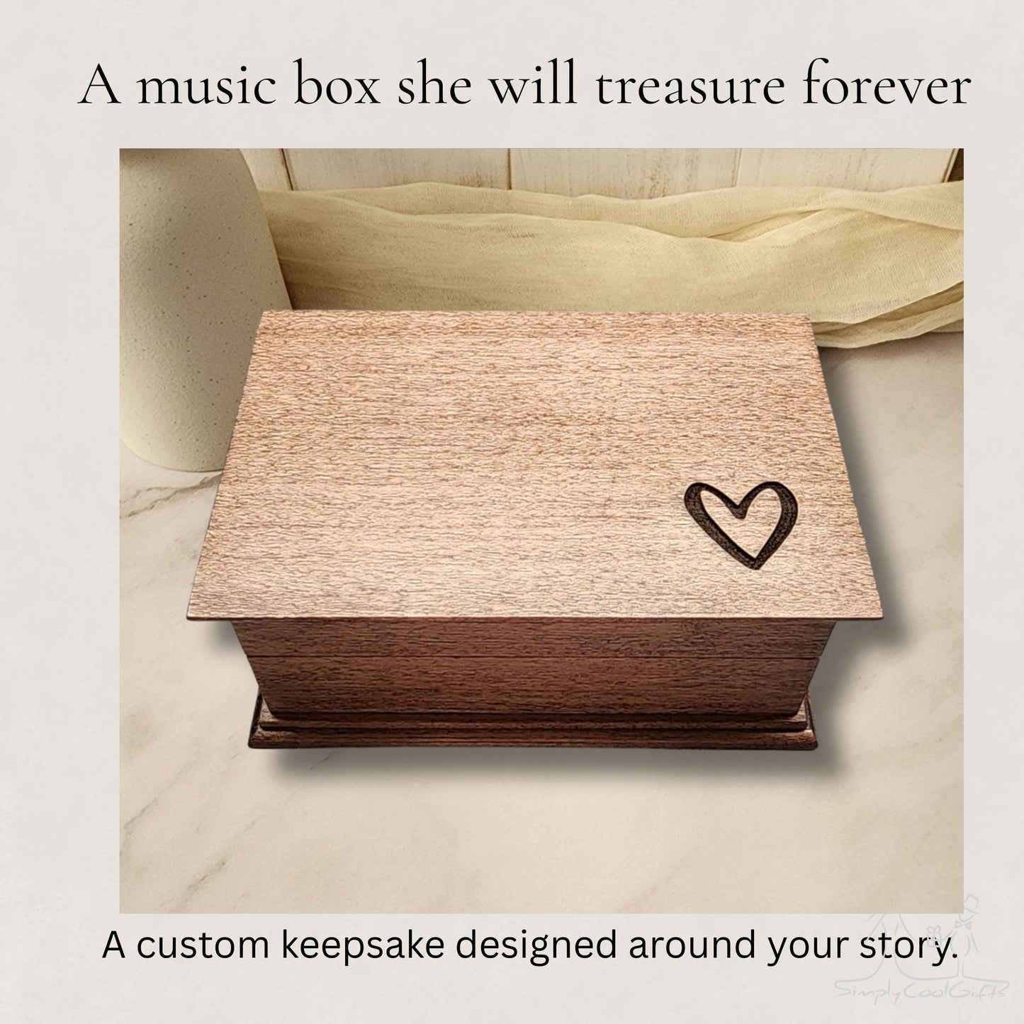 Wooden music box with a heart design on a marble surface, choose any song