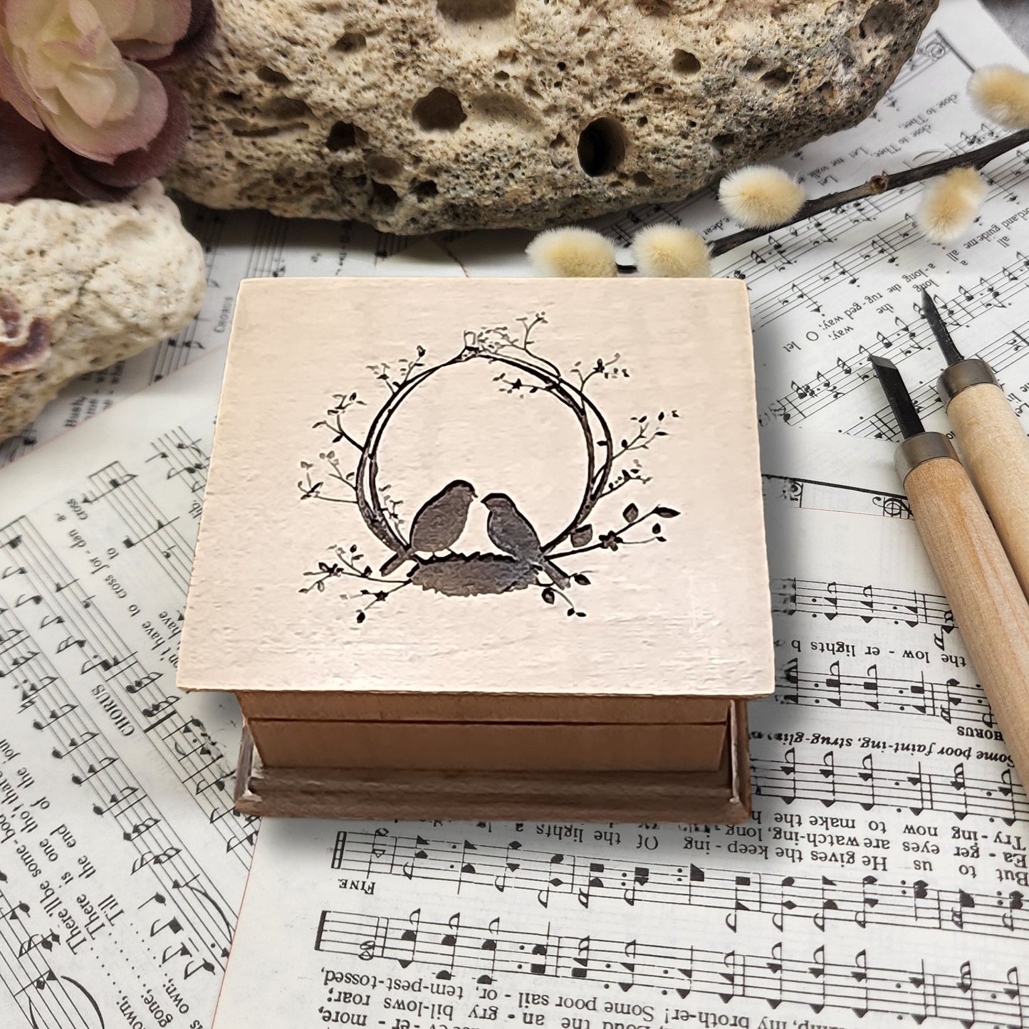 Custom wooden wind-up music box with love birds engraving, available in 16 colors and personalized with a song choice and bottom engraving.