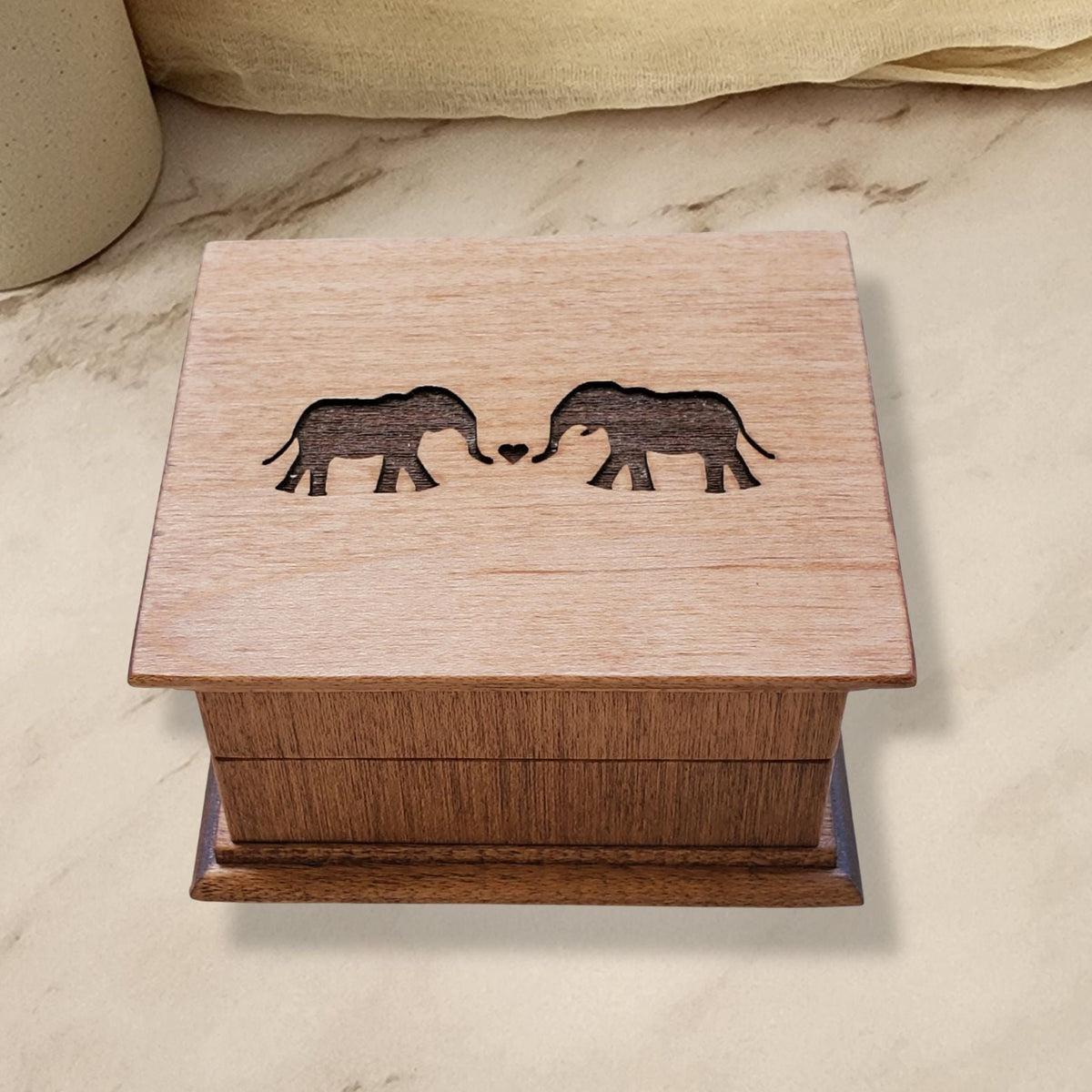 Romantic elephant couples wind up music box engraved with two elephants forming a heart on wooden lid