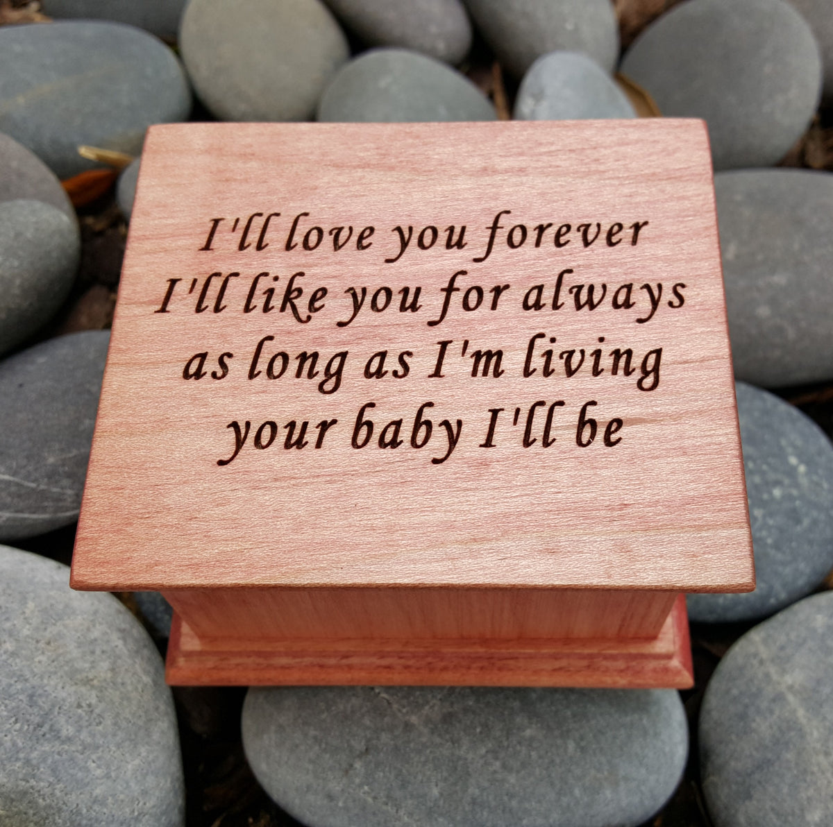 Personalized engraved wind-up music box for mom made of solid wood, handmade keepsake gift. The engraving says
I'll love you forever
I'll like you for always
as long as I'm living 
your baby I'll be