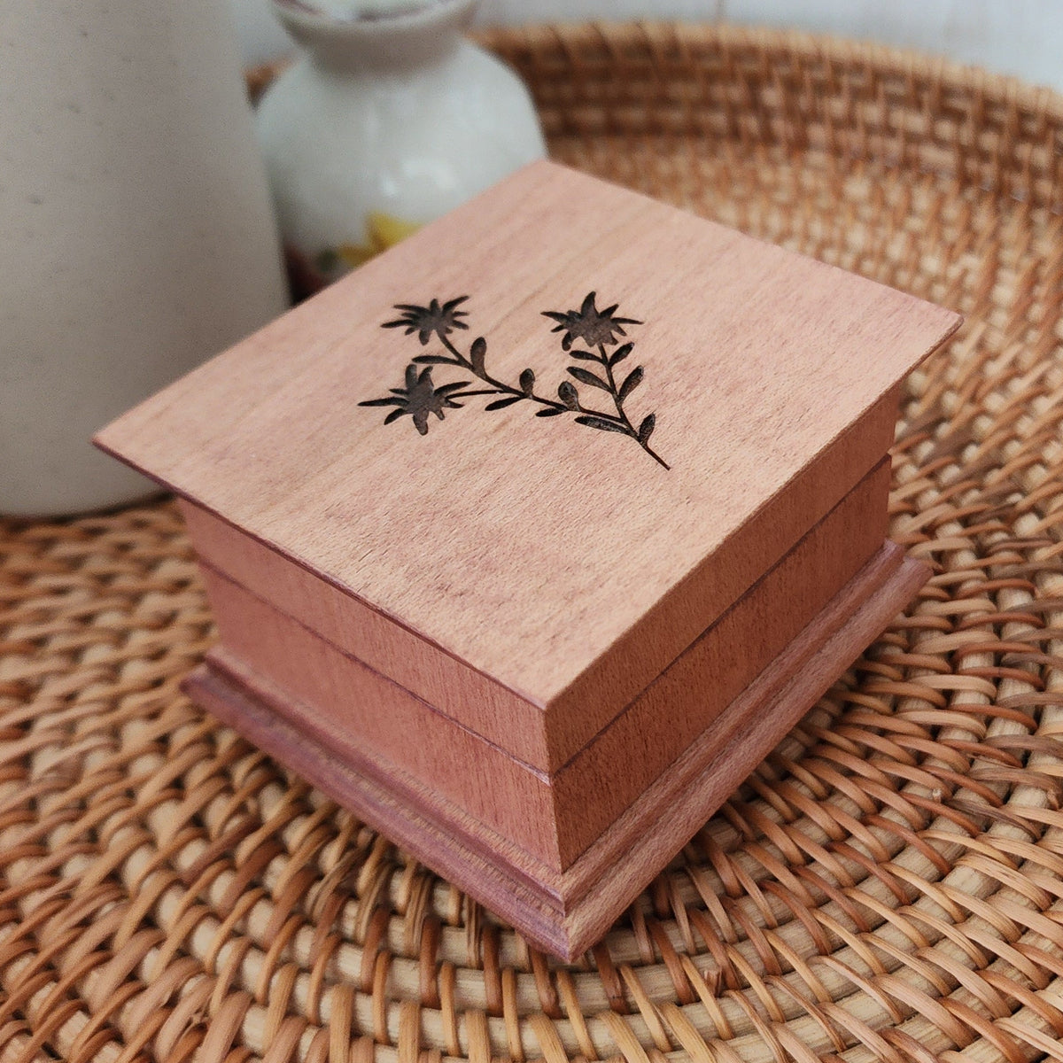 music box engraved with edelweiss flower on the top