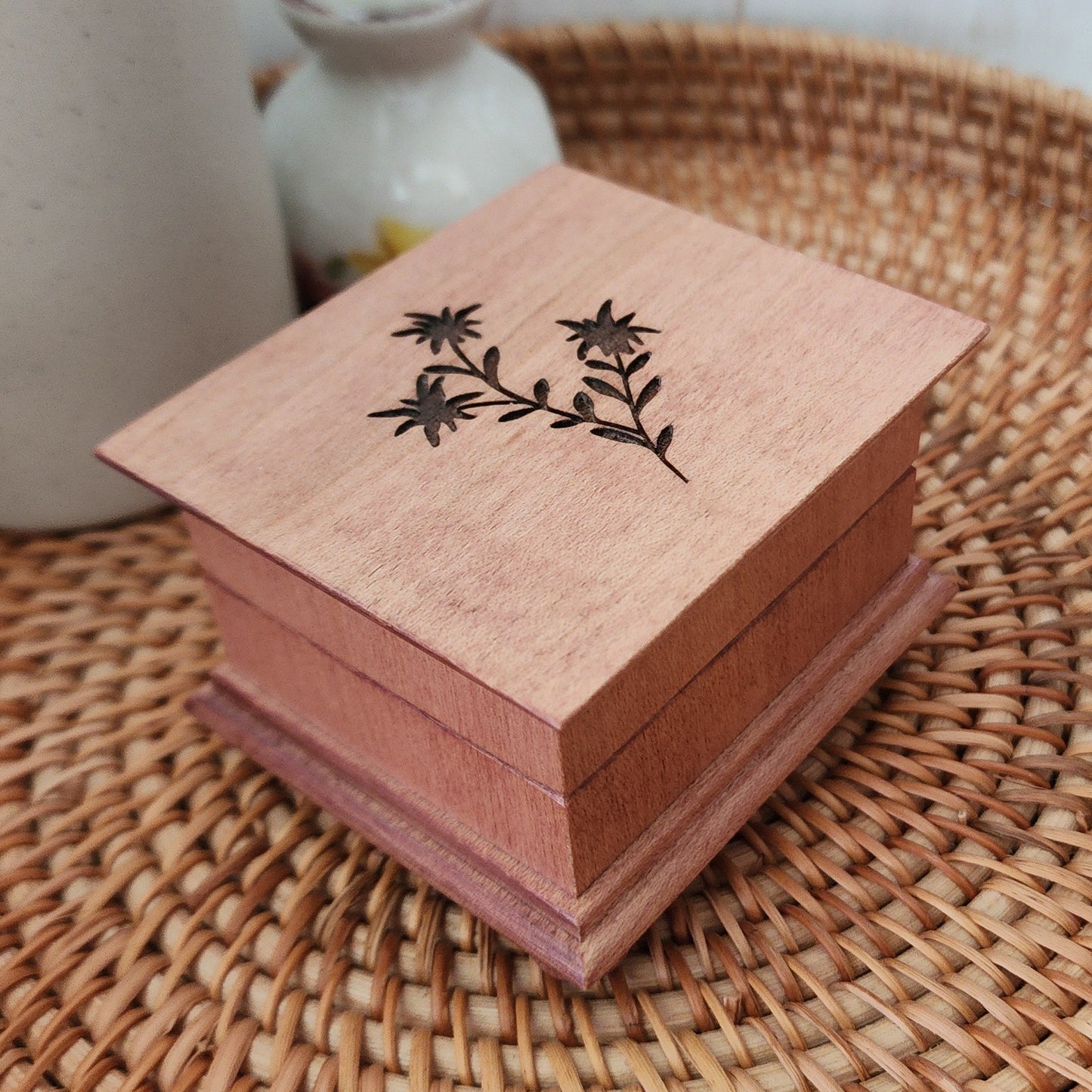 music box engraved with edelweiss flower on the top