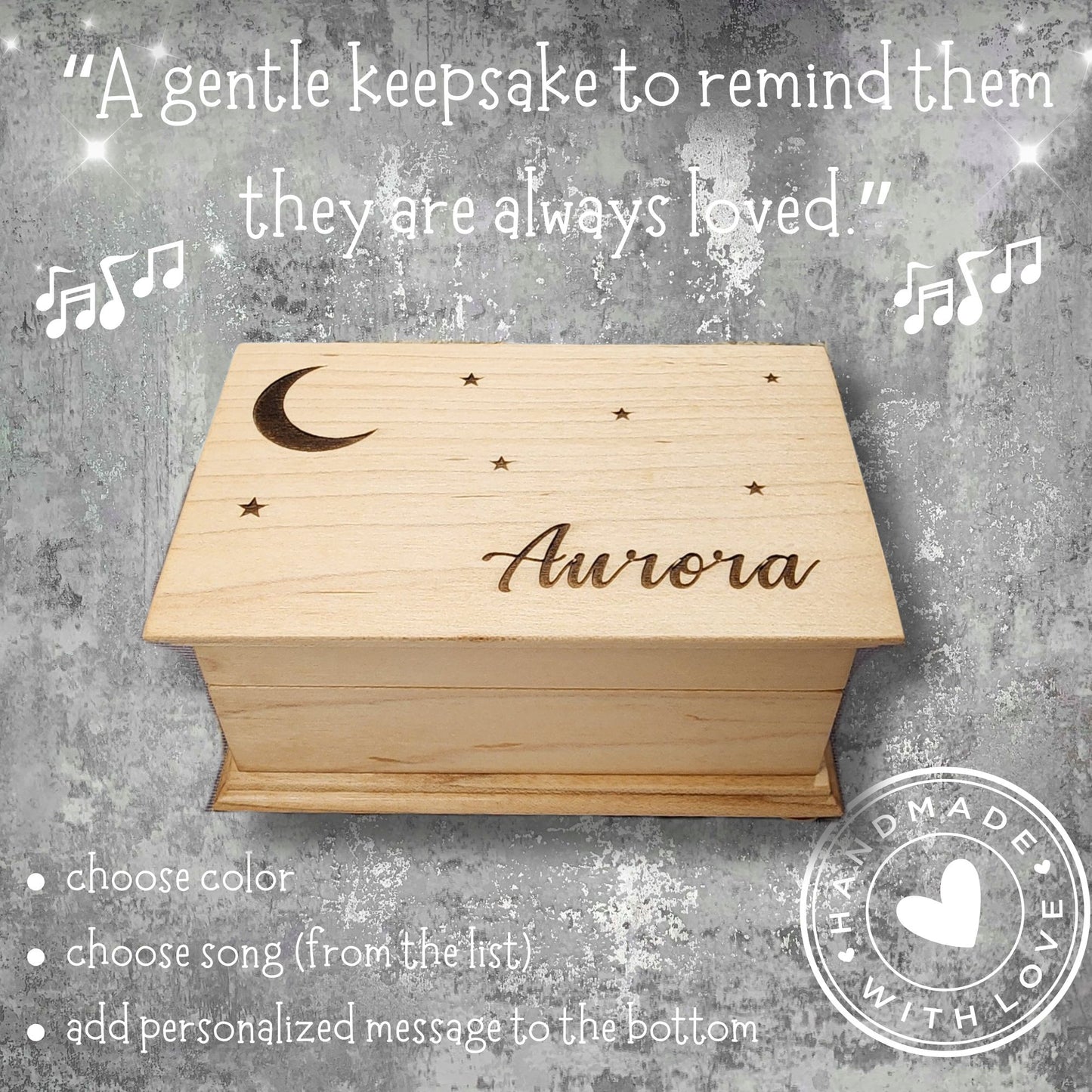 music box with jewelry compartment with moon and stars along with name engraving in flowy cursive font 