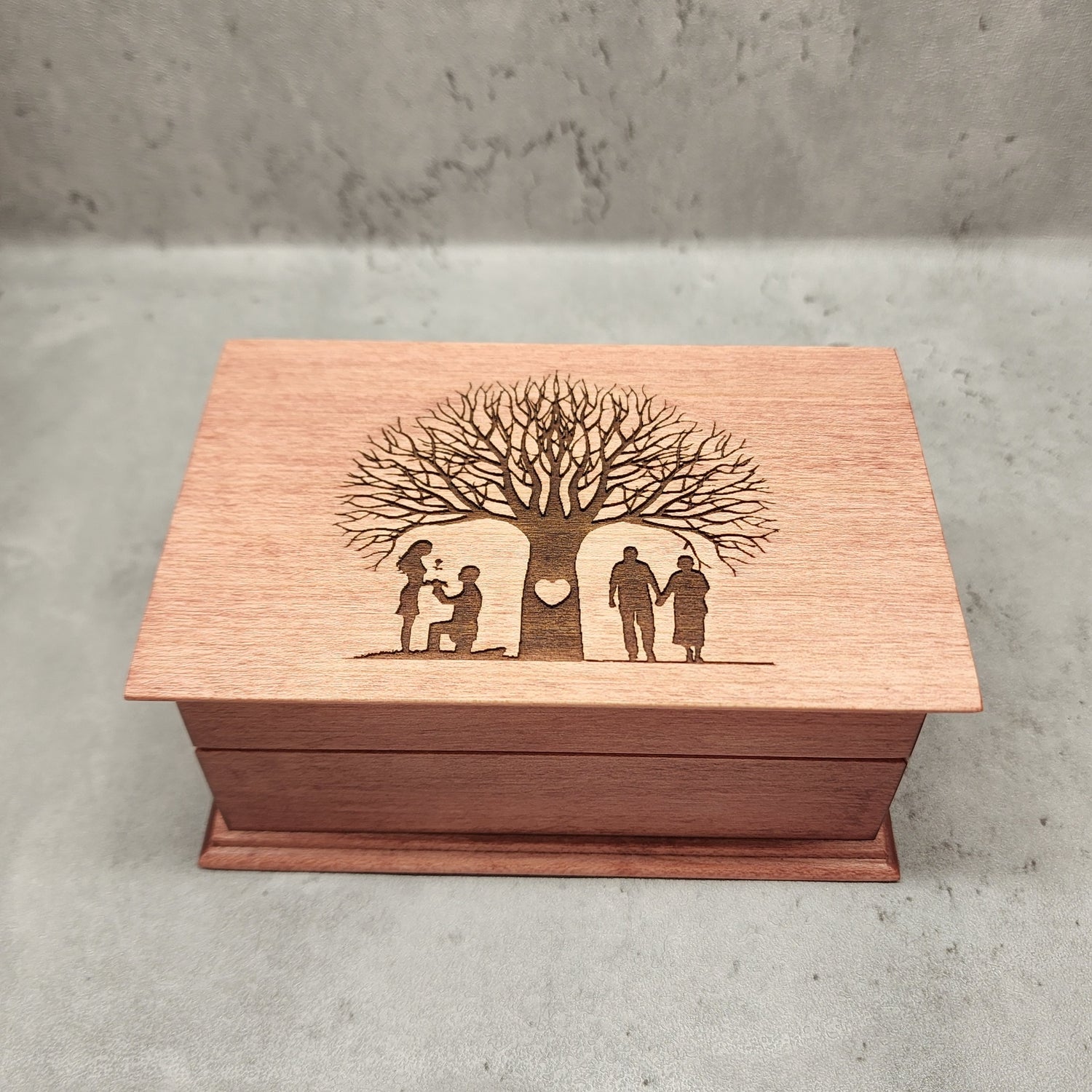 wedding anniversary gift box plays your song, engraved with a tree of life and a couple