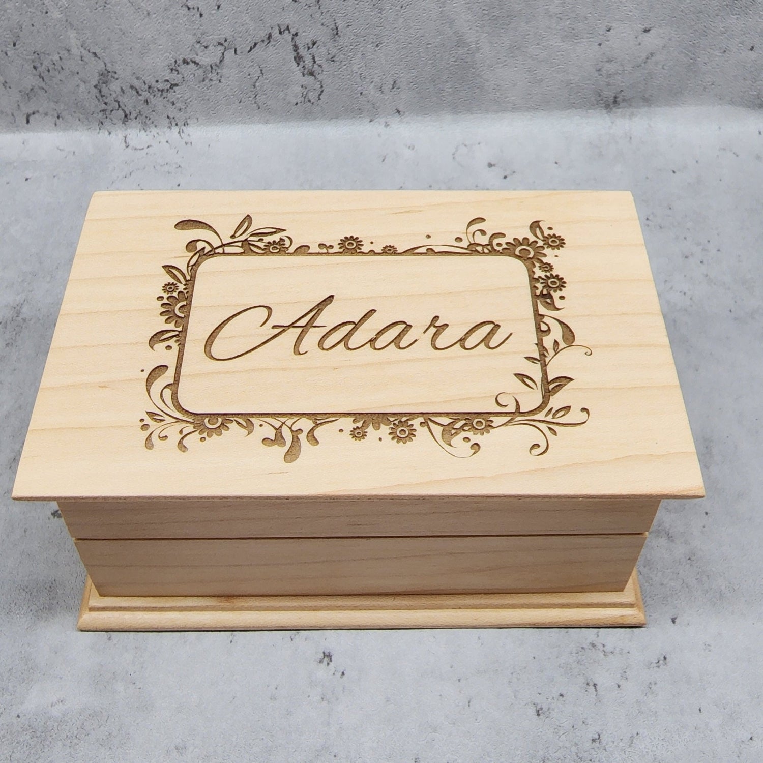 Jewelry box with a floral frame and name engraved in cursive, choose color and any songs