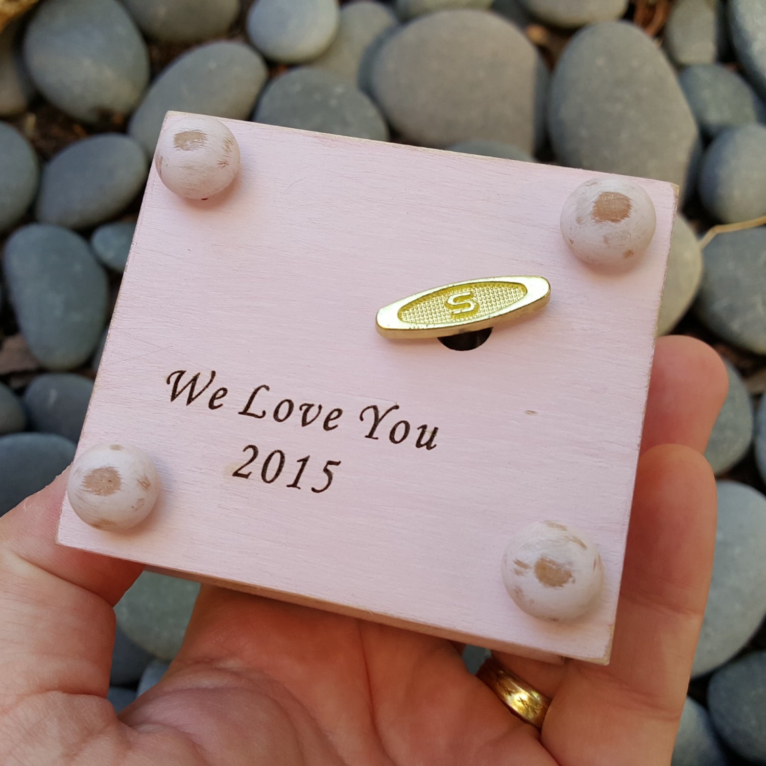 personalized engraving on a custom-made music box 