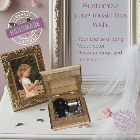 Personalized engraved wind-up music box playing "You've got a friend". With a picture of a little girl in the background