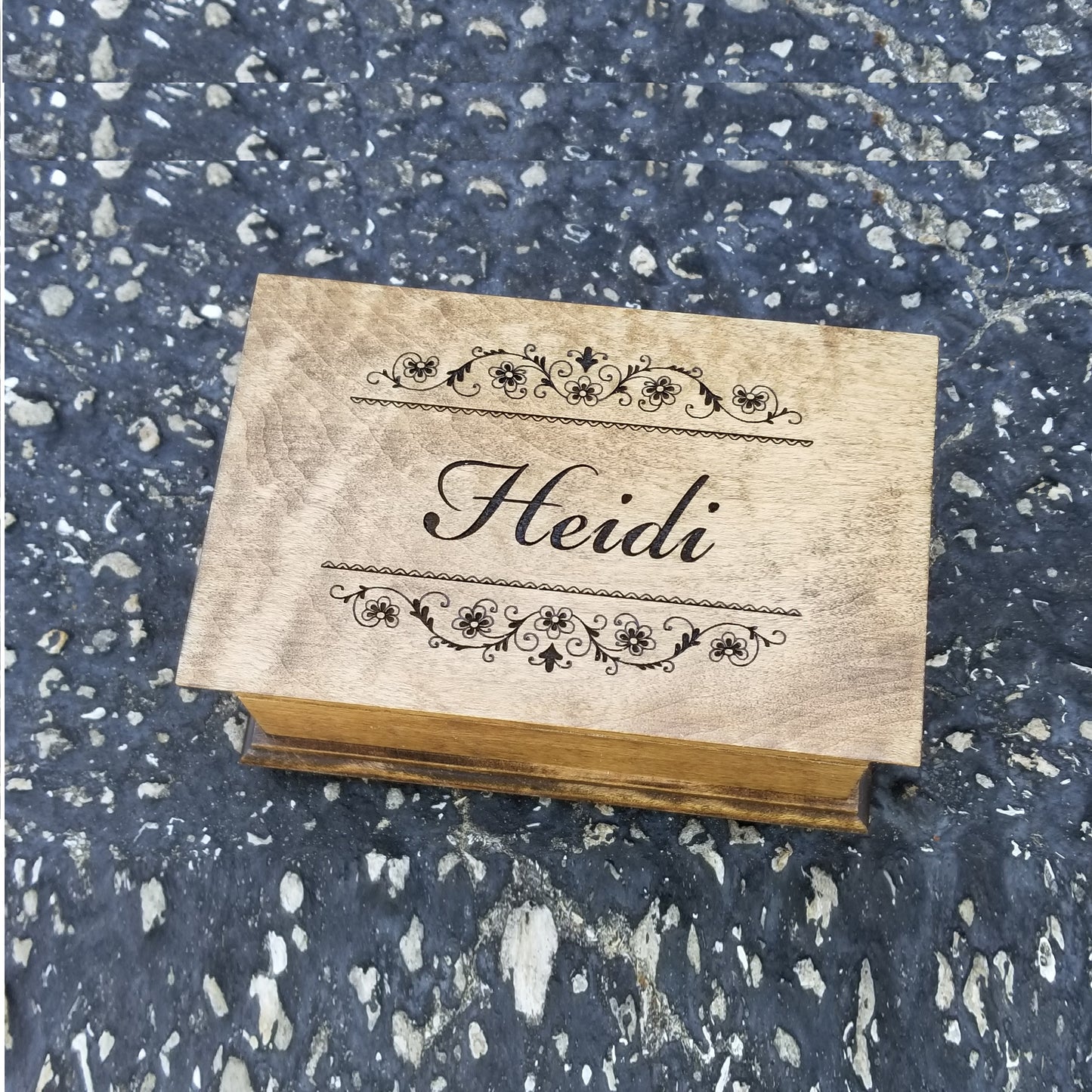 Name engraved jewelry box with floral borders on top with built in music player