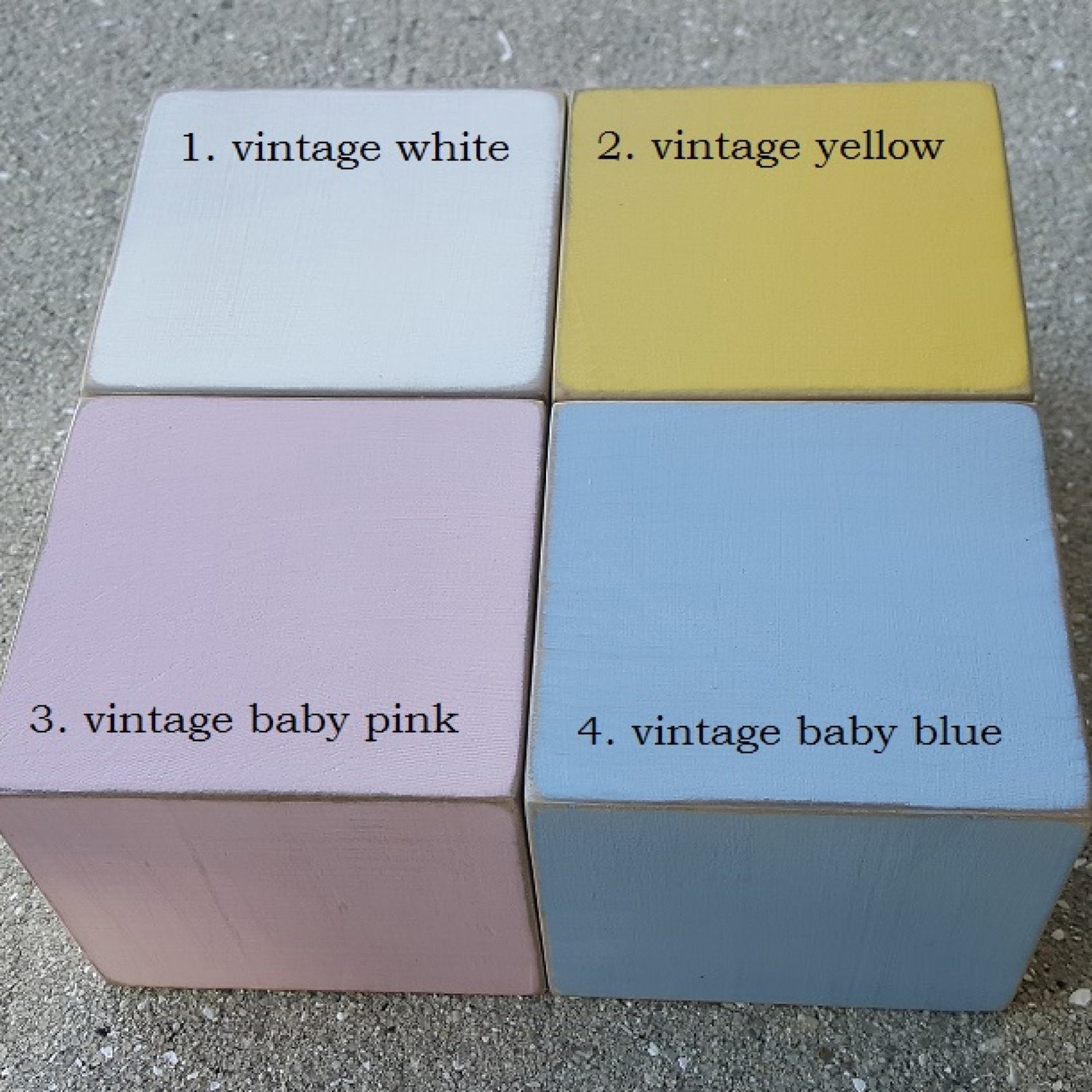 wooden block color options, white, pink, yellow, blue