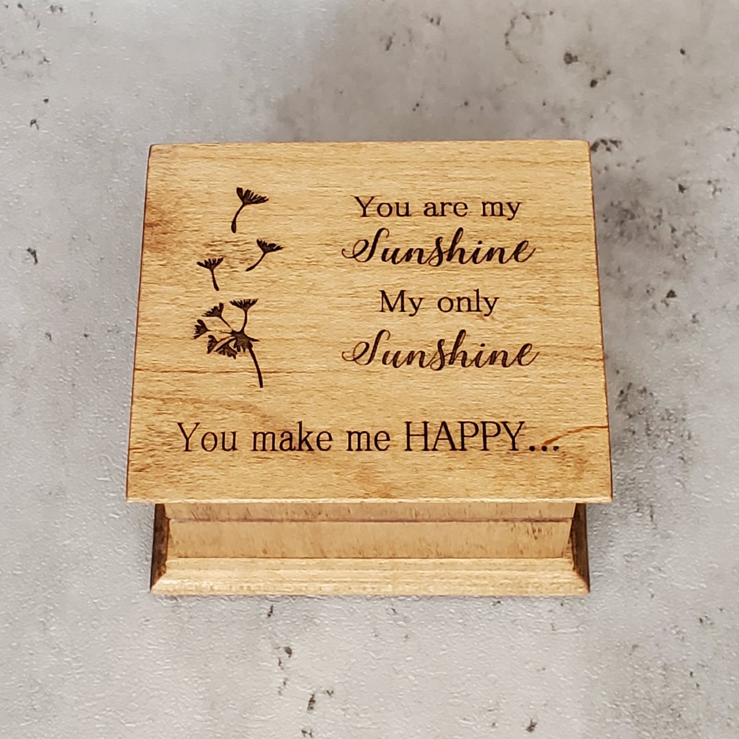 You are my sunshine My only Sunshine, You make me happy quote engraved on top along with dandelion flying