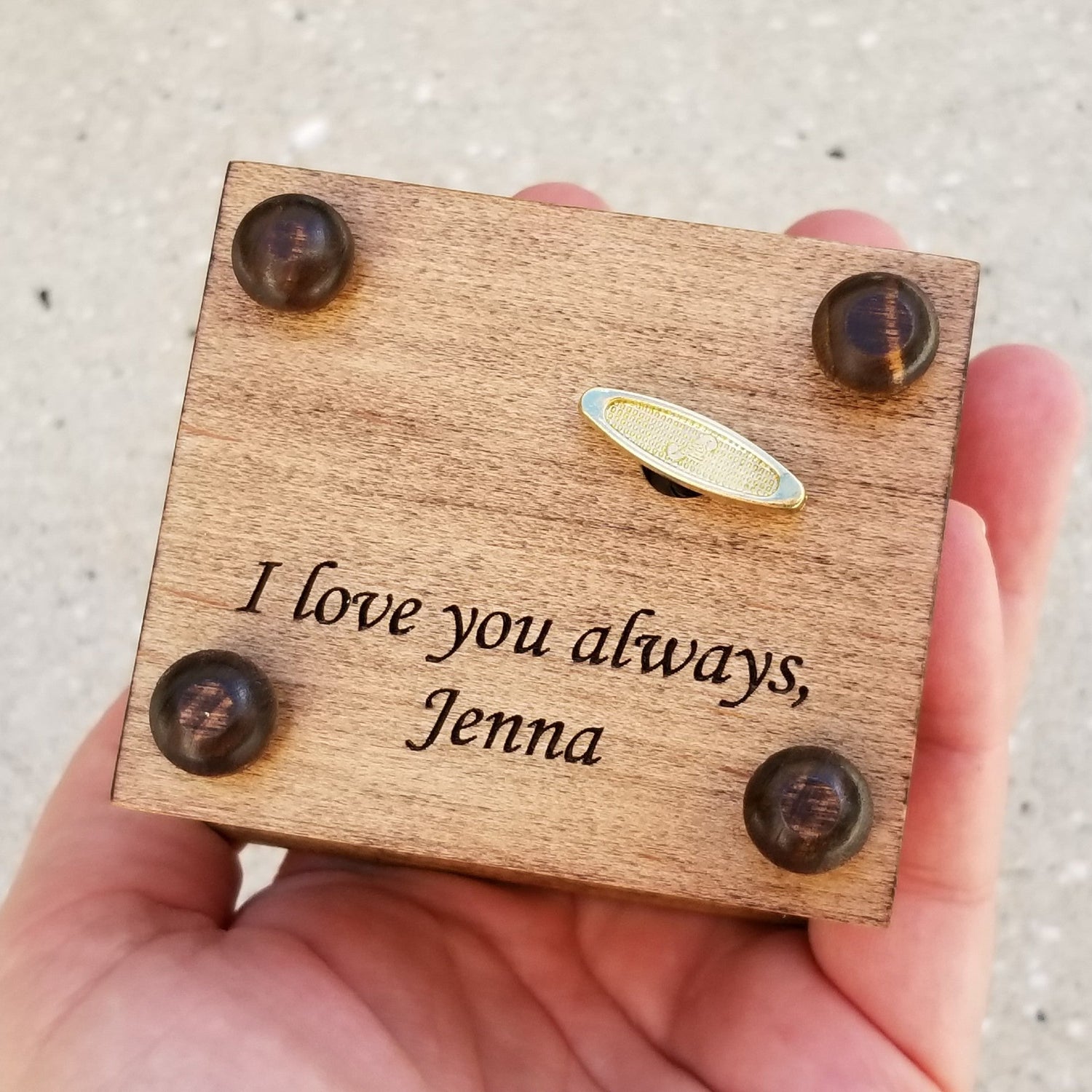 personalized engraving on the bottom side of box