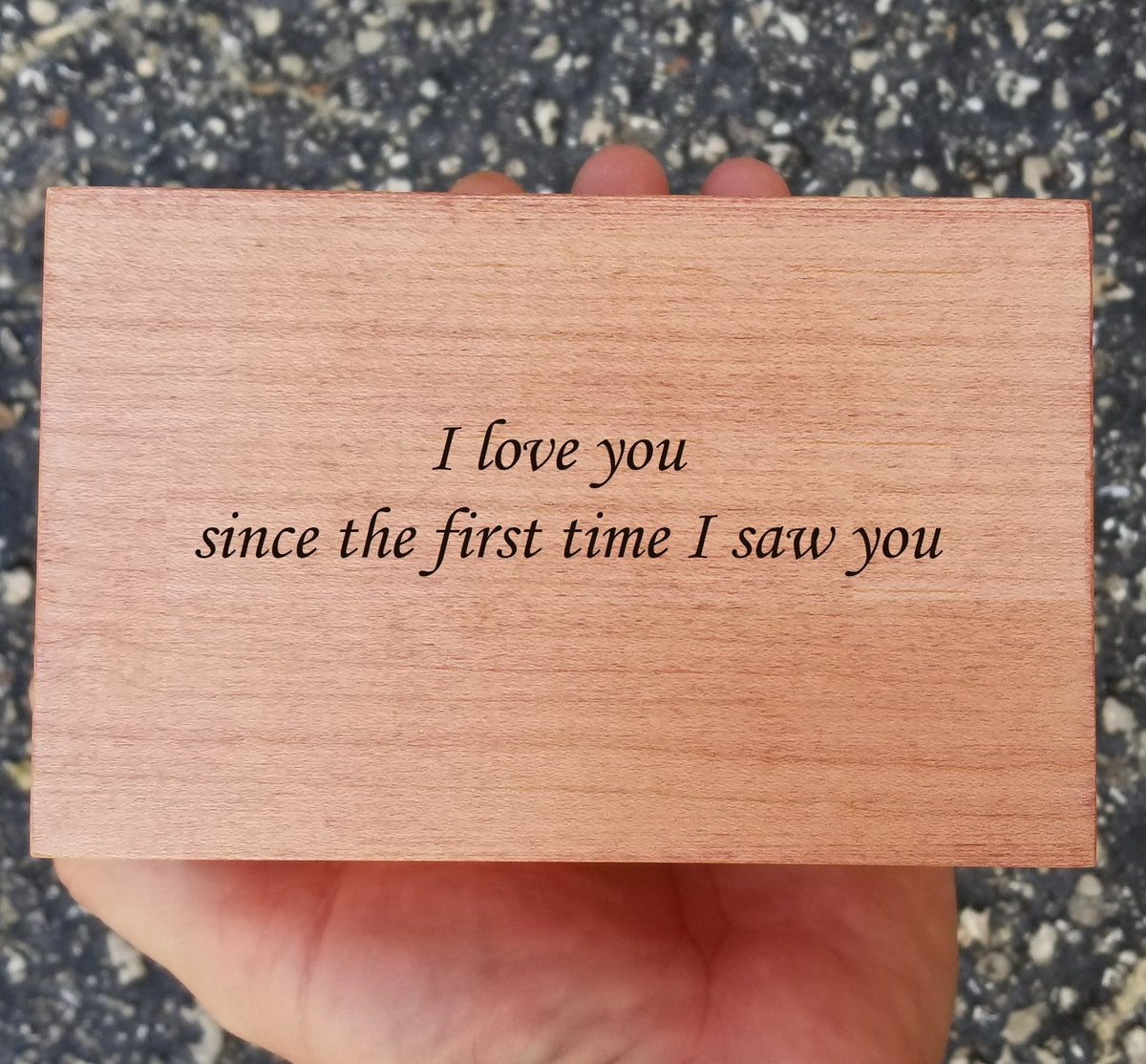 jewelry box engraving with a personalized message on the bottom side of box