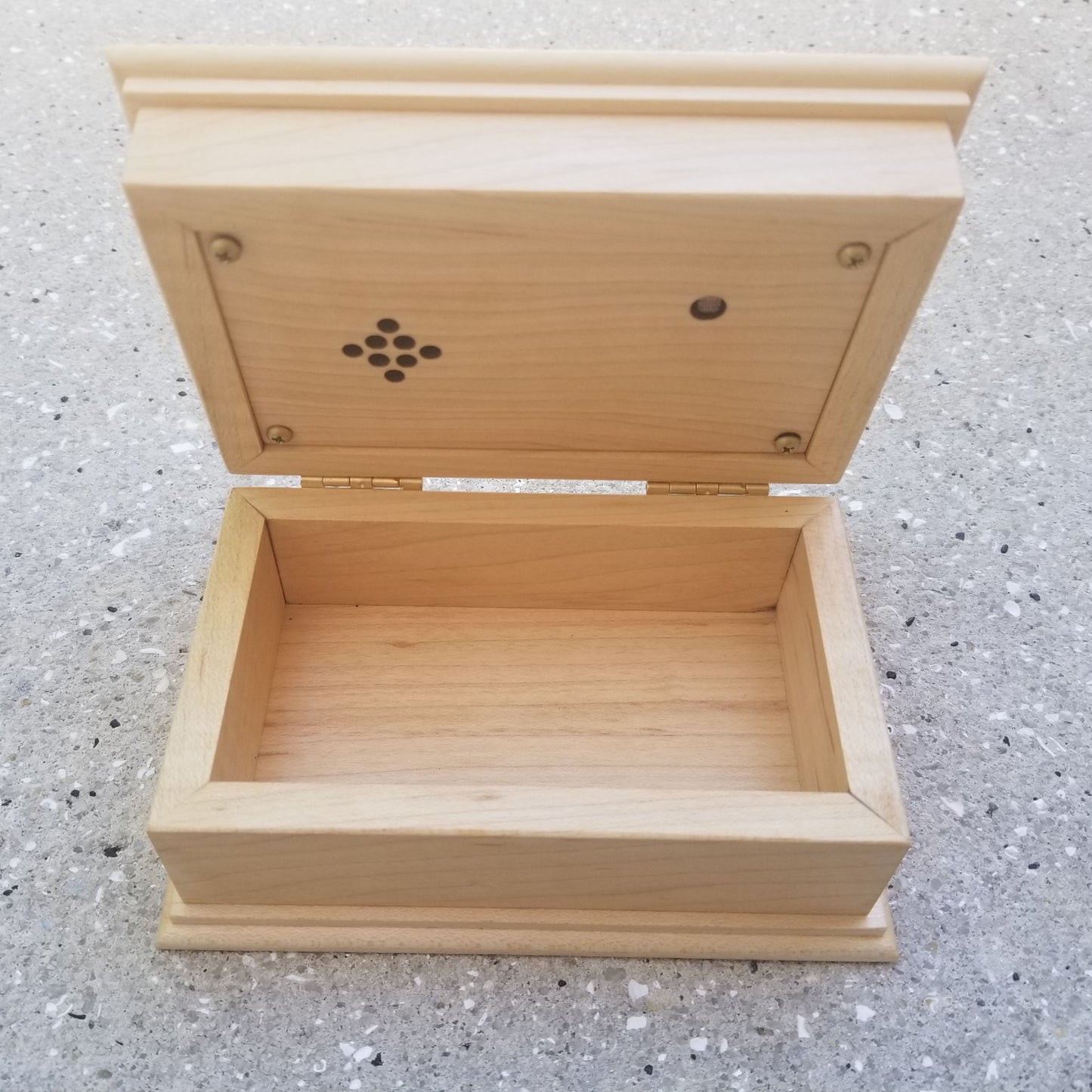 music jewelry box with an open lid showing speakers and light sensor, available at Simplycoolgift