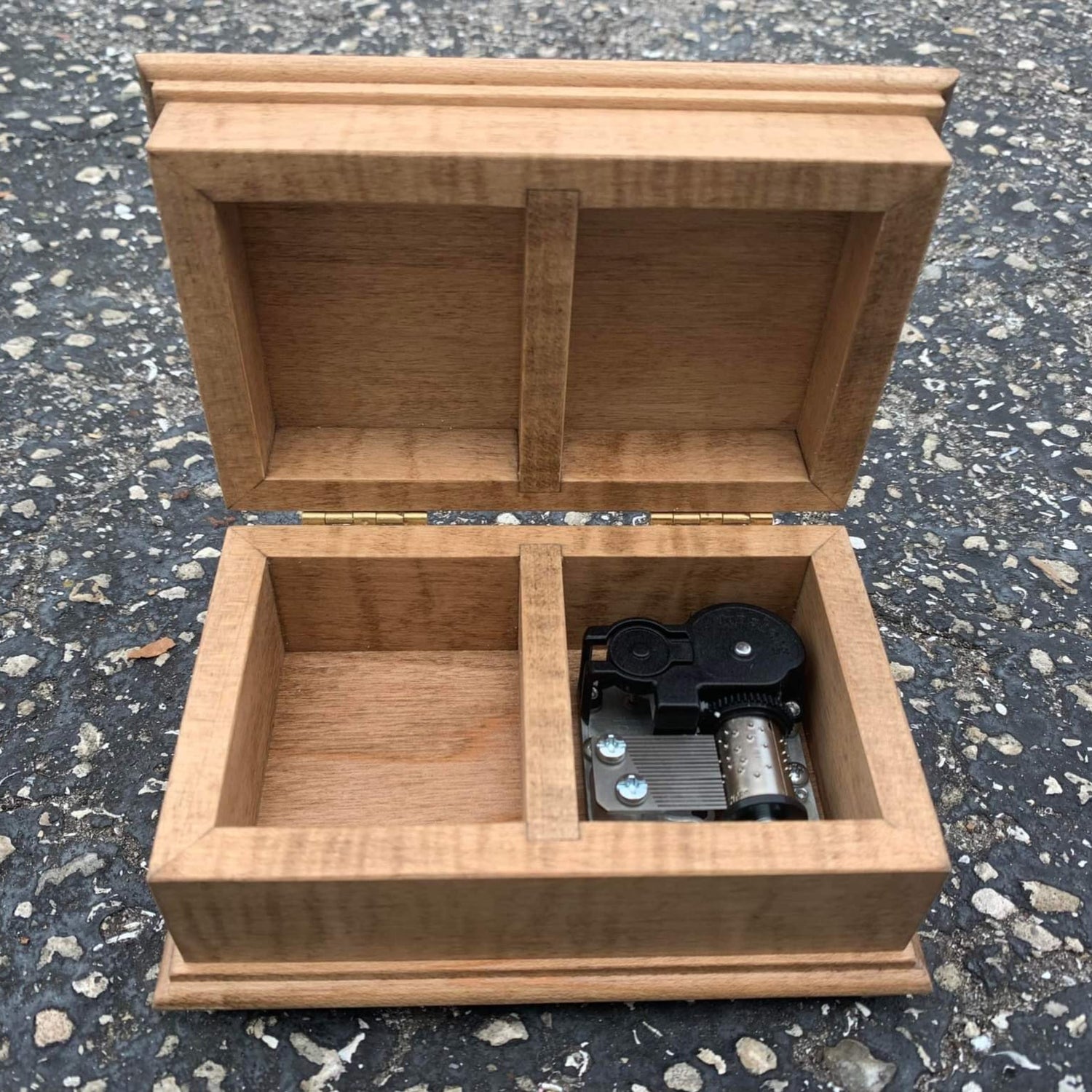 jewelry box with built in musical movement and extra compartment for keepsake
