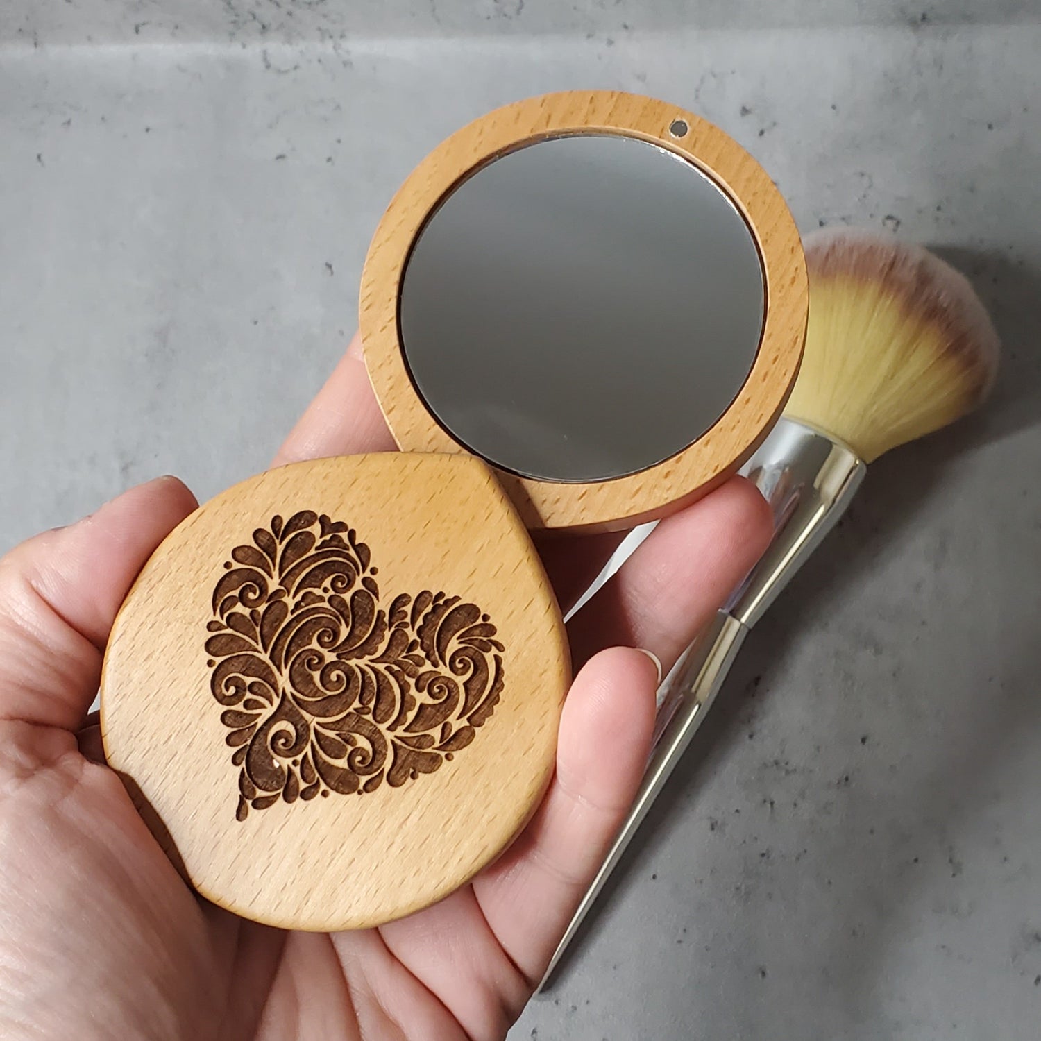 Small mirror fits into little girls hands as well, made of maple wood and it has a heart engraved on the front