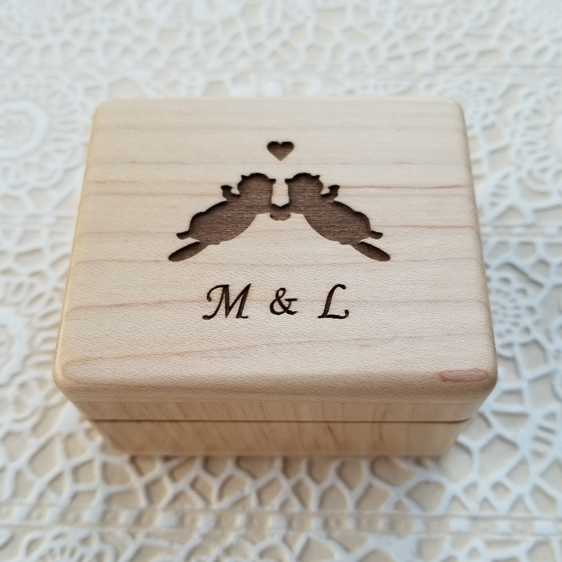 engagement box with otters 