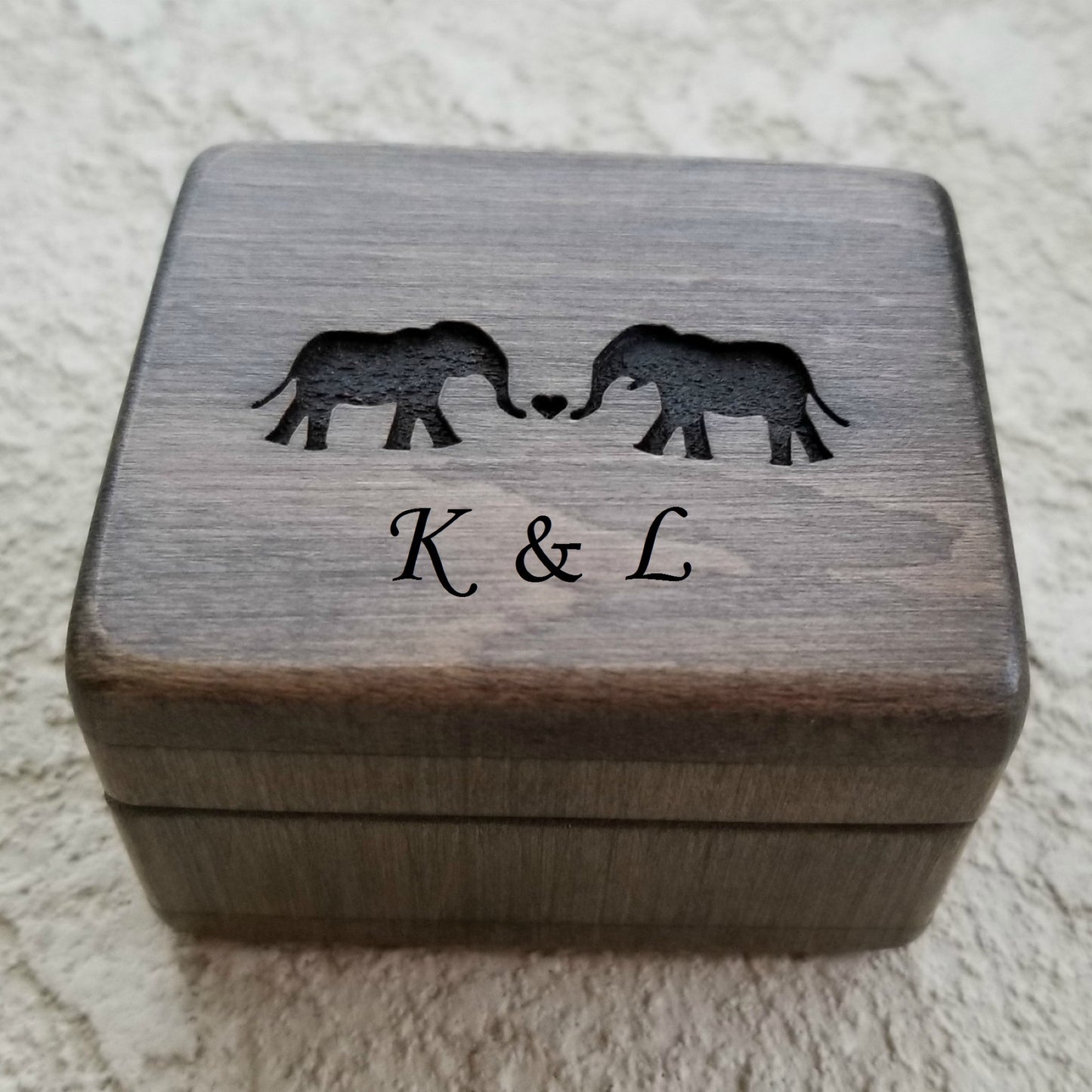 ring box with love elephants and your initials under the elephants